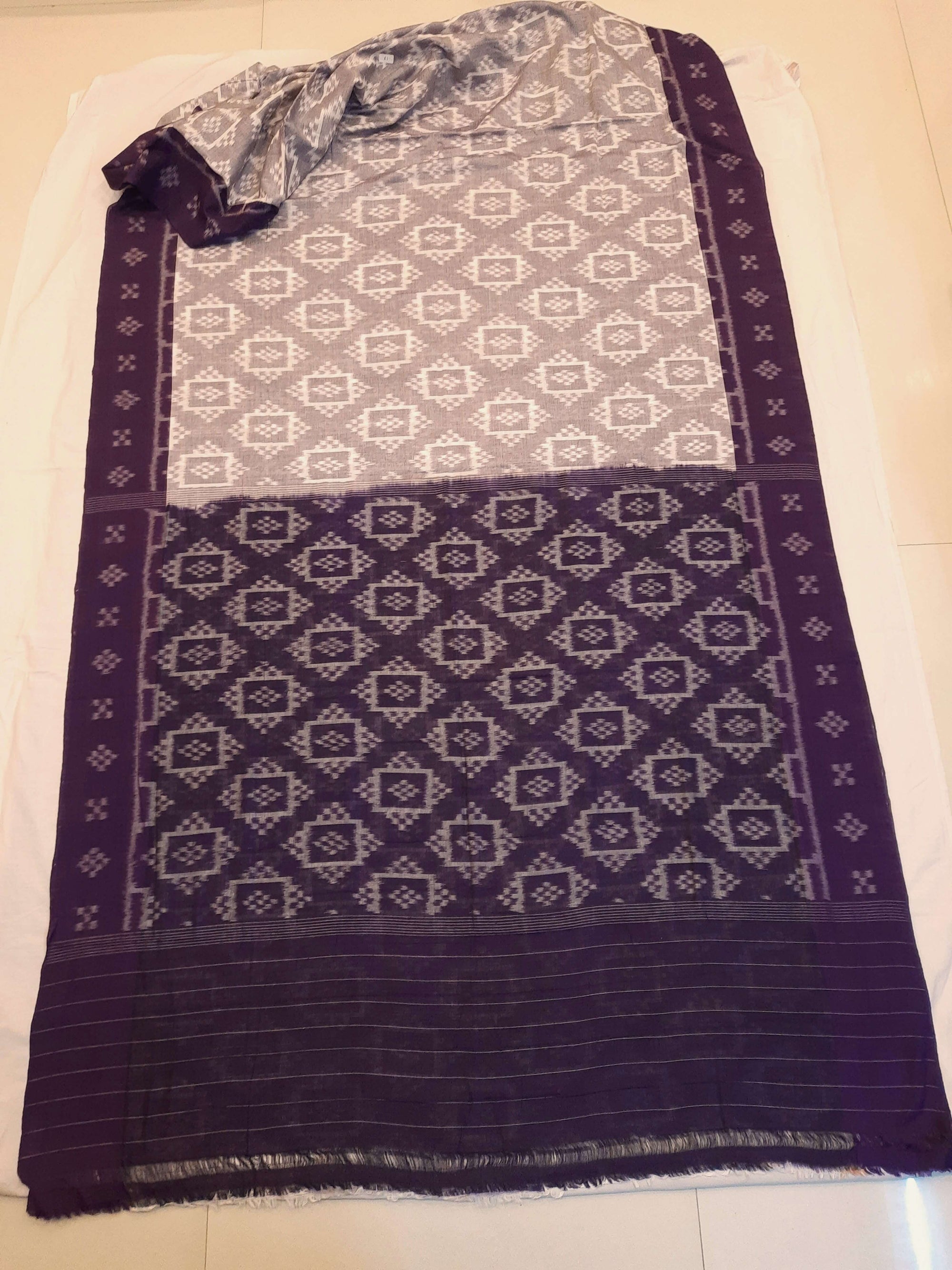 Offwhite with Purple Odisha Ikat saree with cotton ikat blouse piece