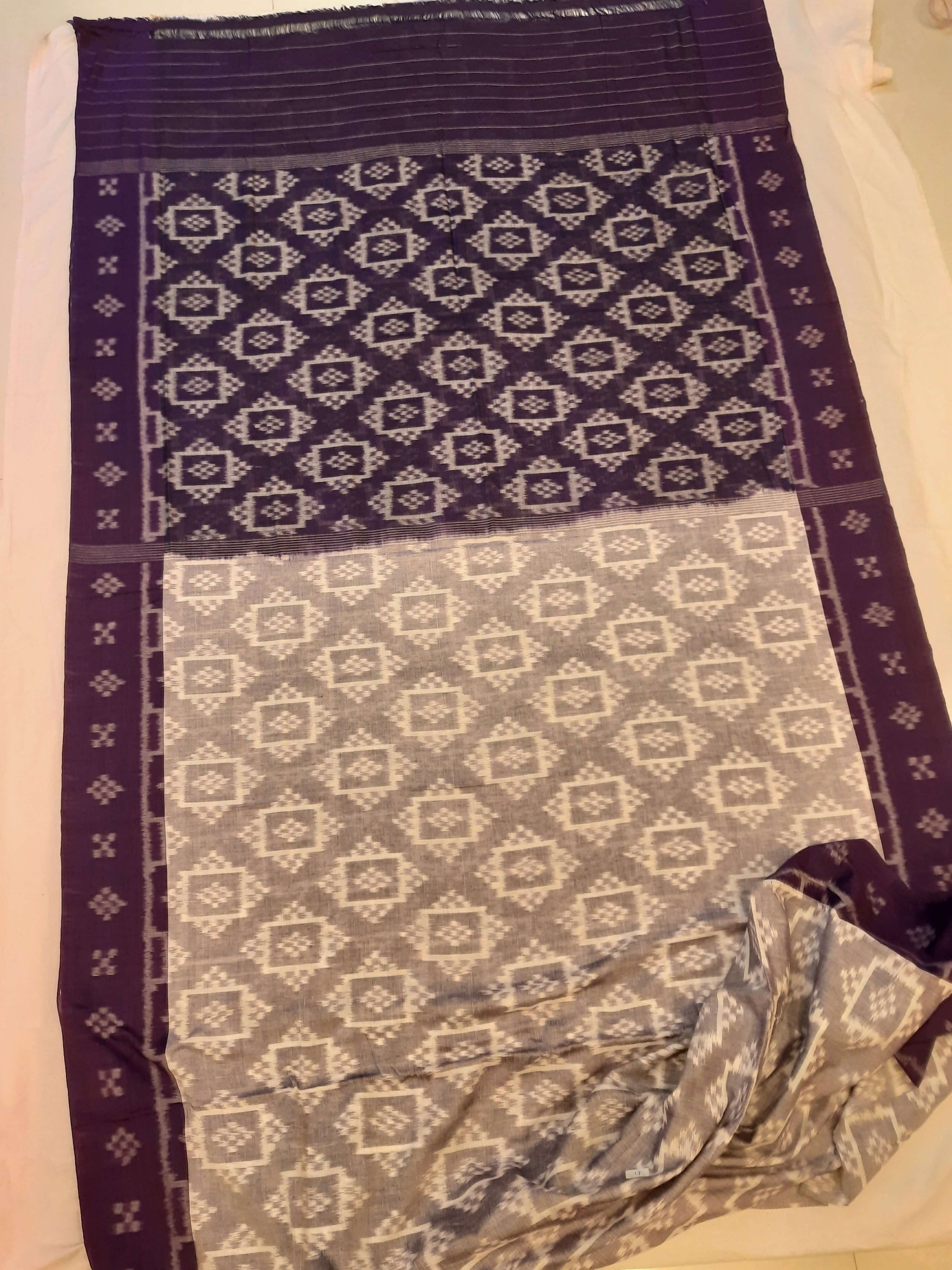 Offwhite with Purple Odisha Ikat saree with cotton ikat blouse piece