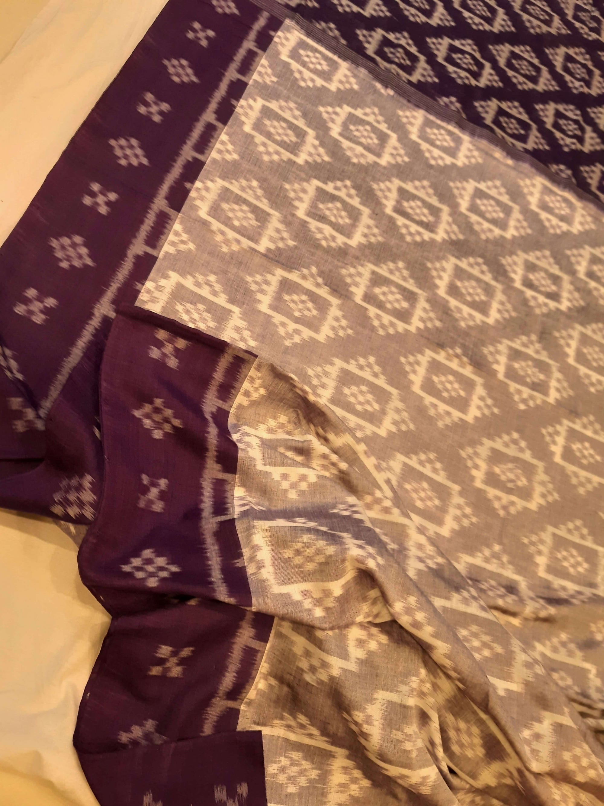 Offwhite with Purple Odisha Ikat saree with cotton ikat blouse piece