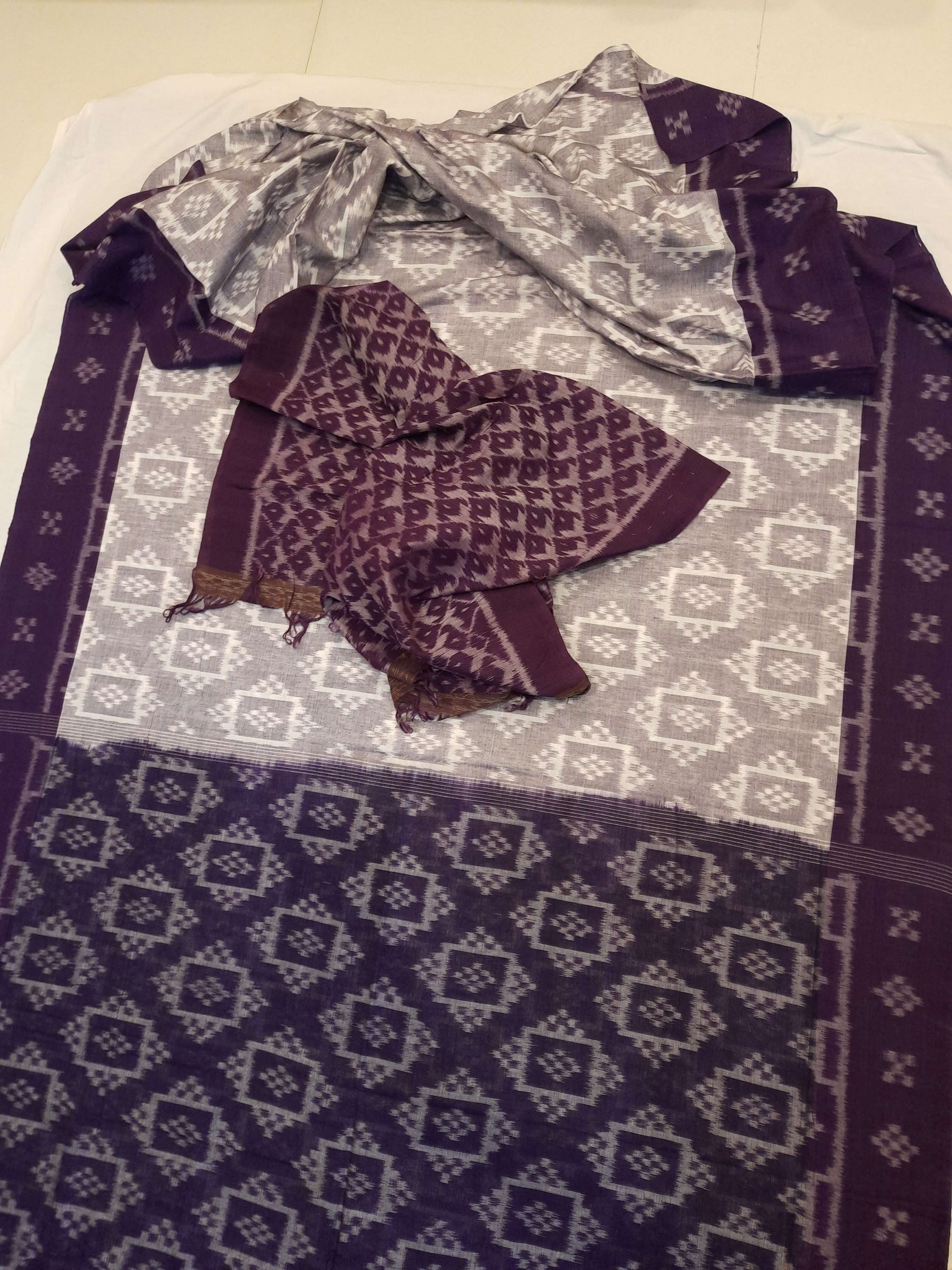 Offwhite with Purple Odisha Ikat saree with cotton ikat blouse piece