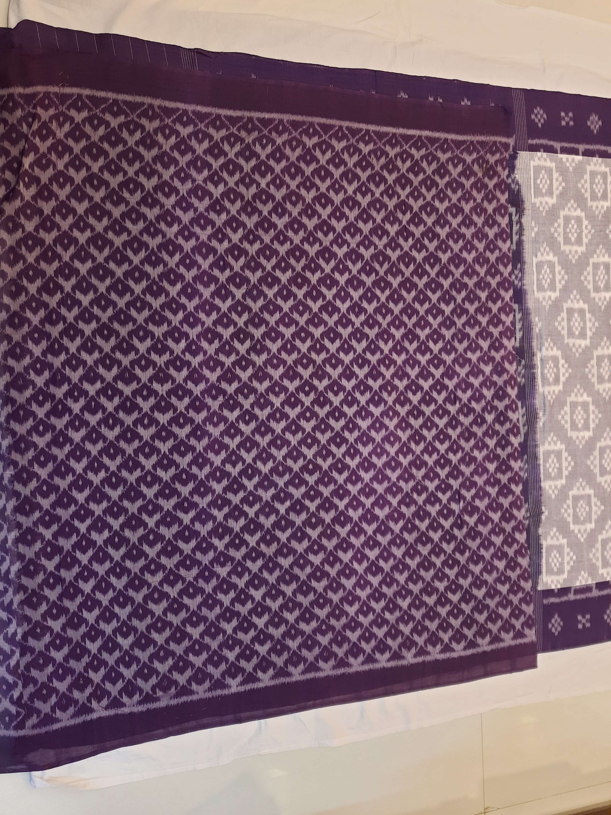 Offwhite with Purple Odisha Ikat saree with cotton ikat blouse piece
