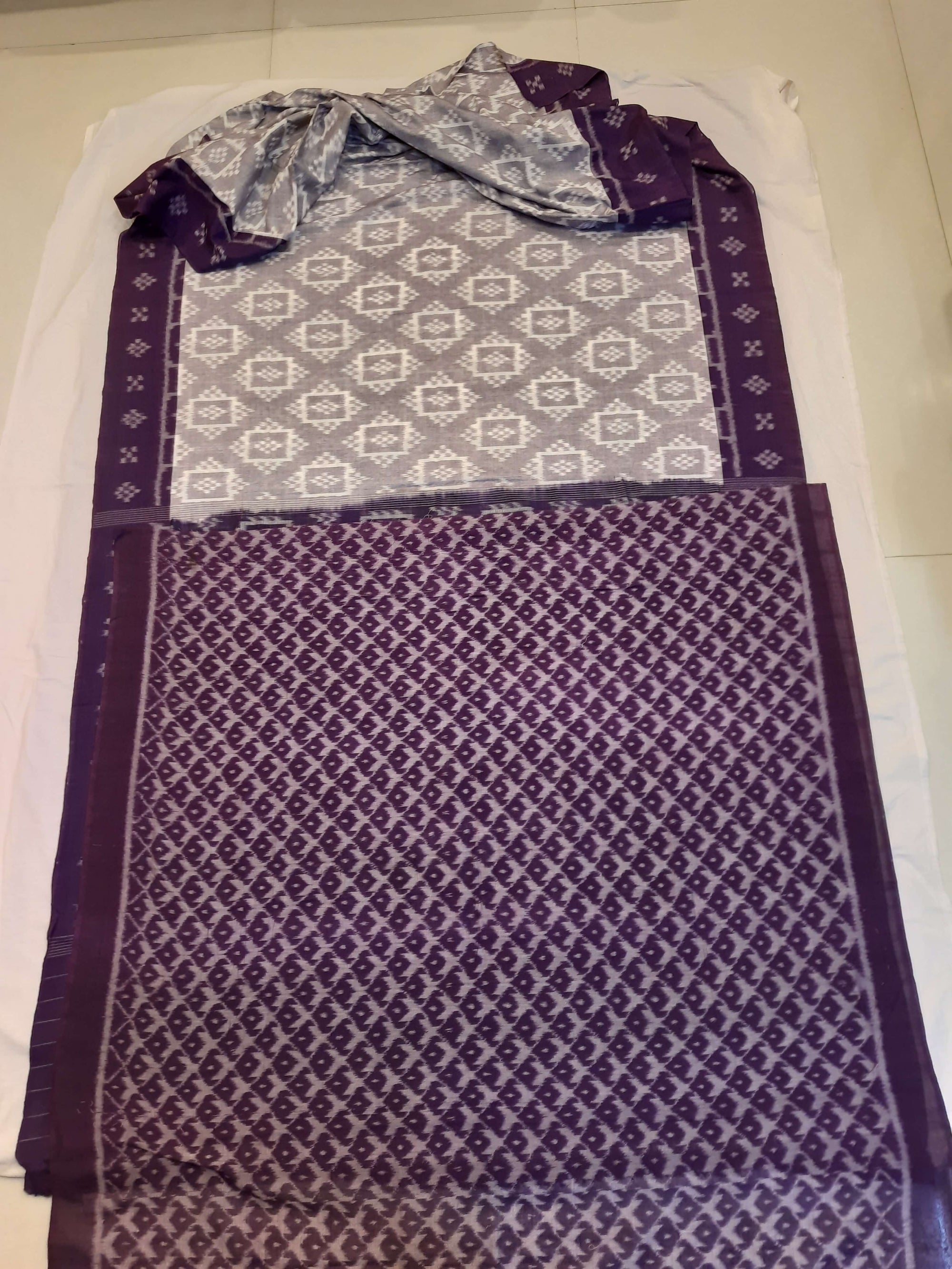 Offwhite with Purple Odisha Ikat saree with cotton ikat blouse piece