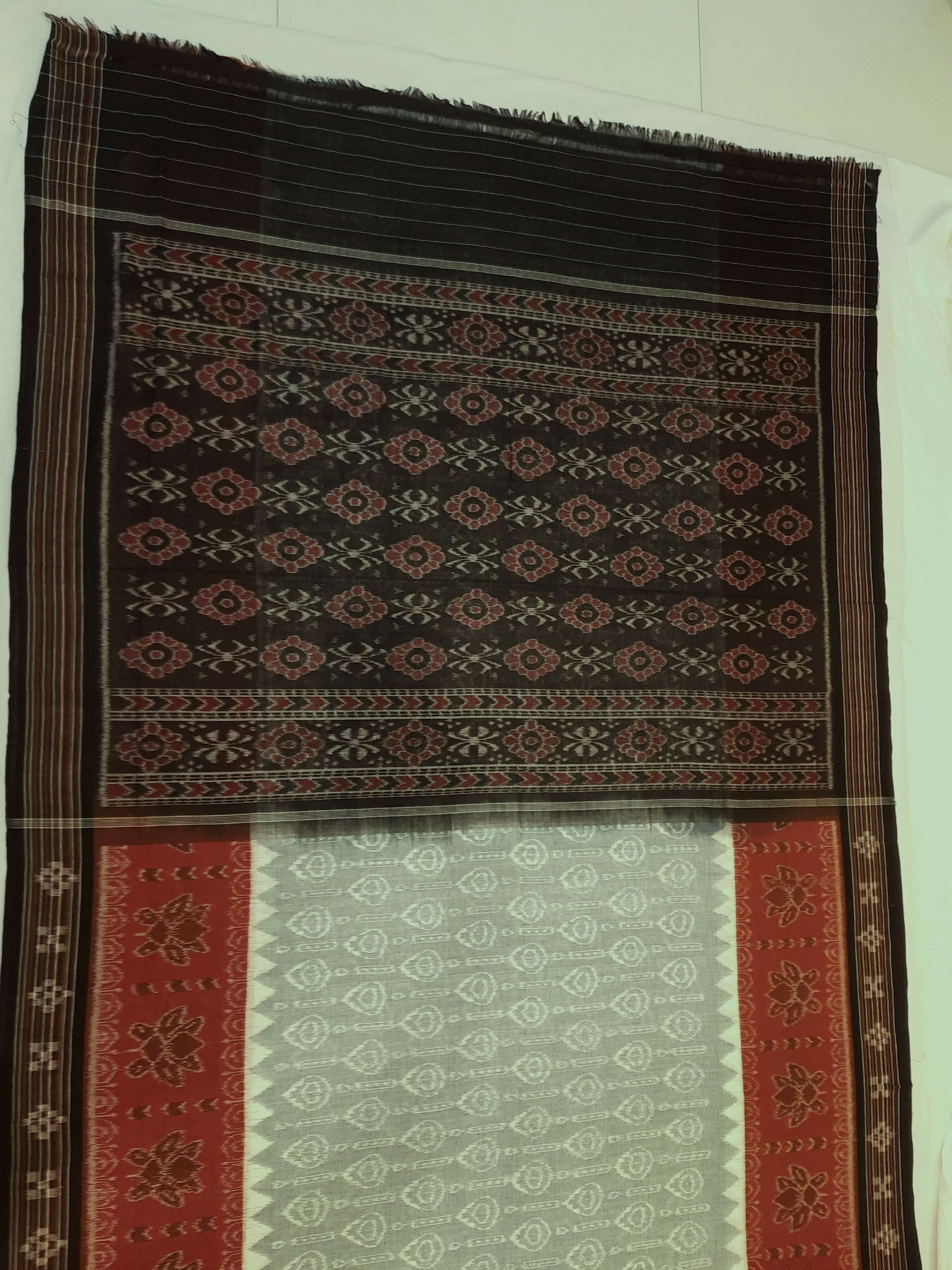 Green wide border Odisha Ikat saree with cotton ikat blouse piece