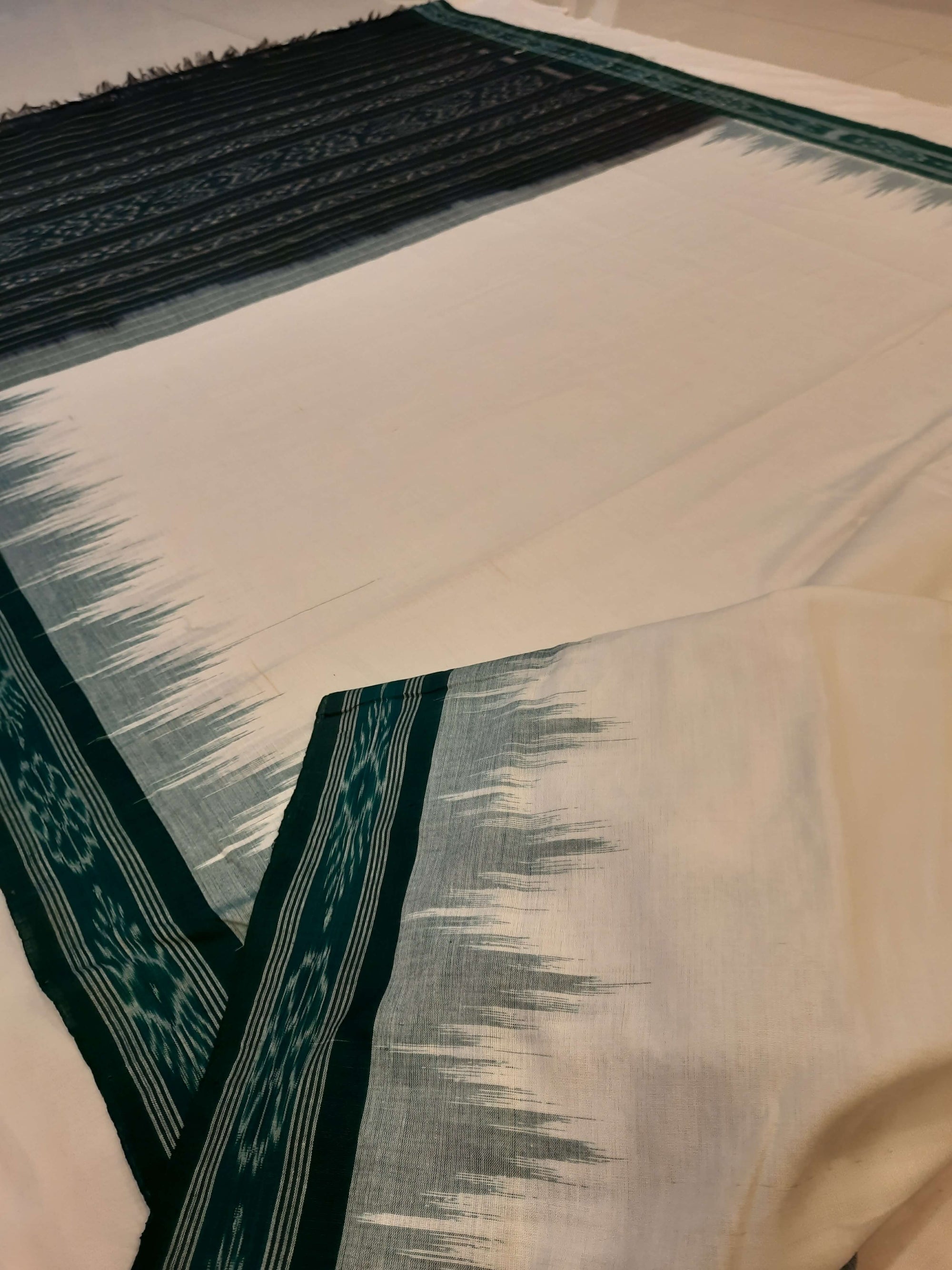 White with Green Odisha Ikat saree with cotton ikat blouse piece