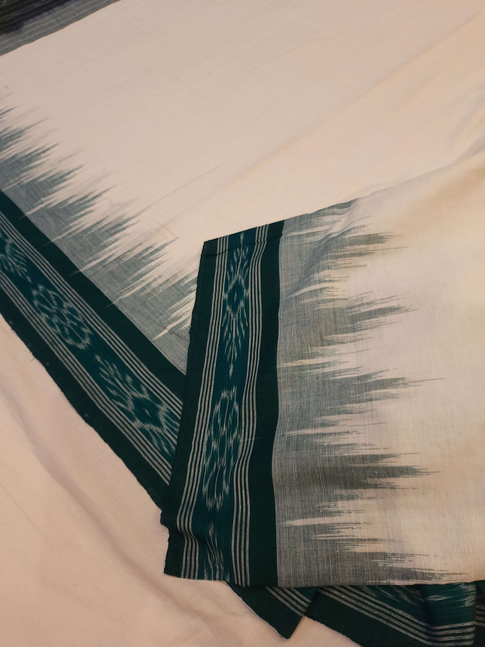 White with Green Odisha Ikat saree with cotton ikat blouse piece