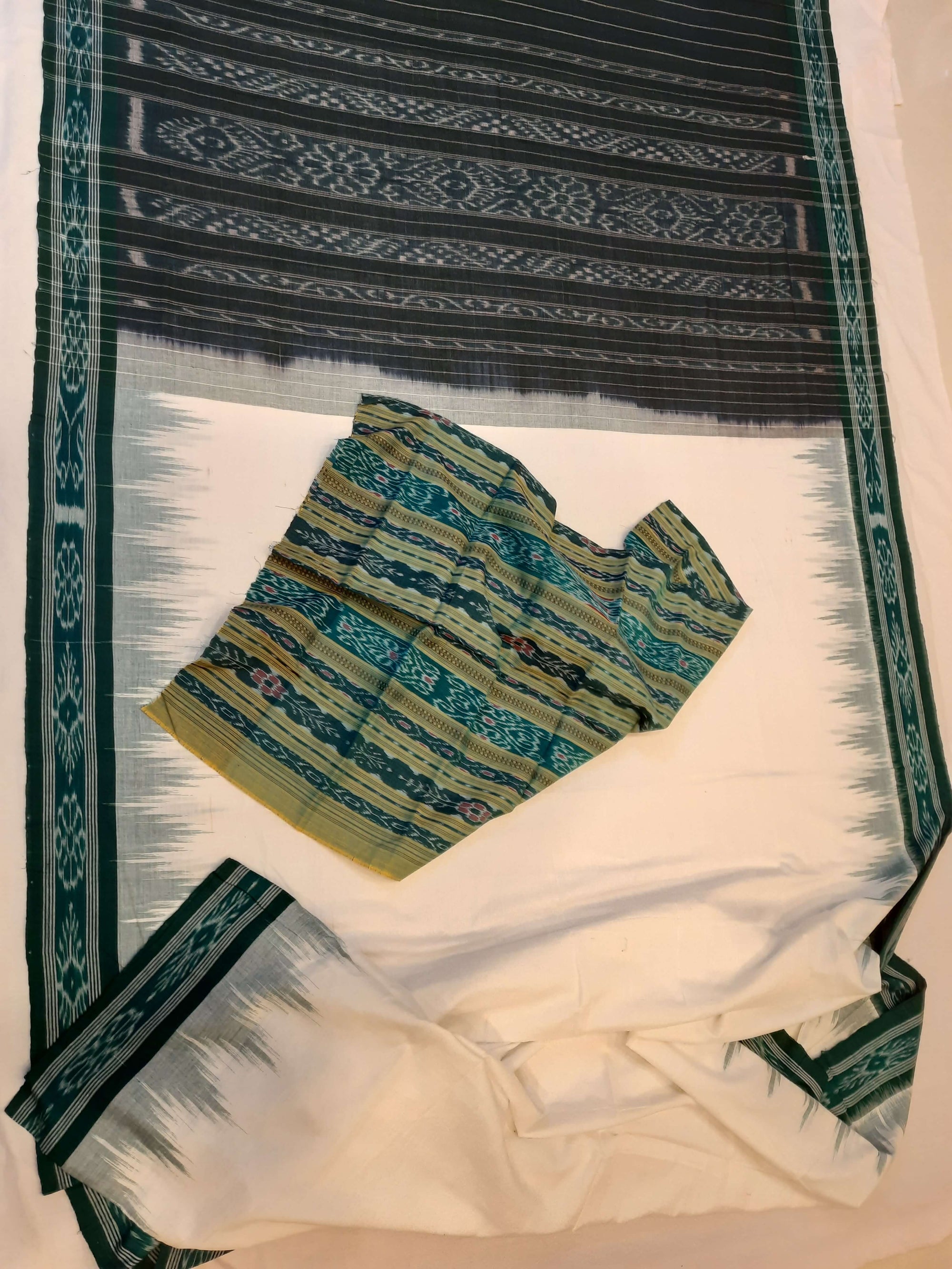 White with Green Odisha Ikat saree with cotton ikat blouse piece