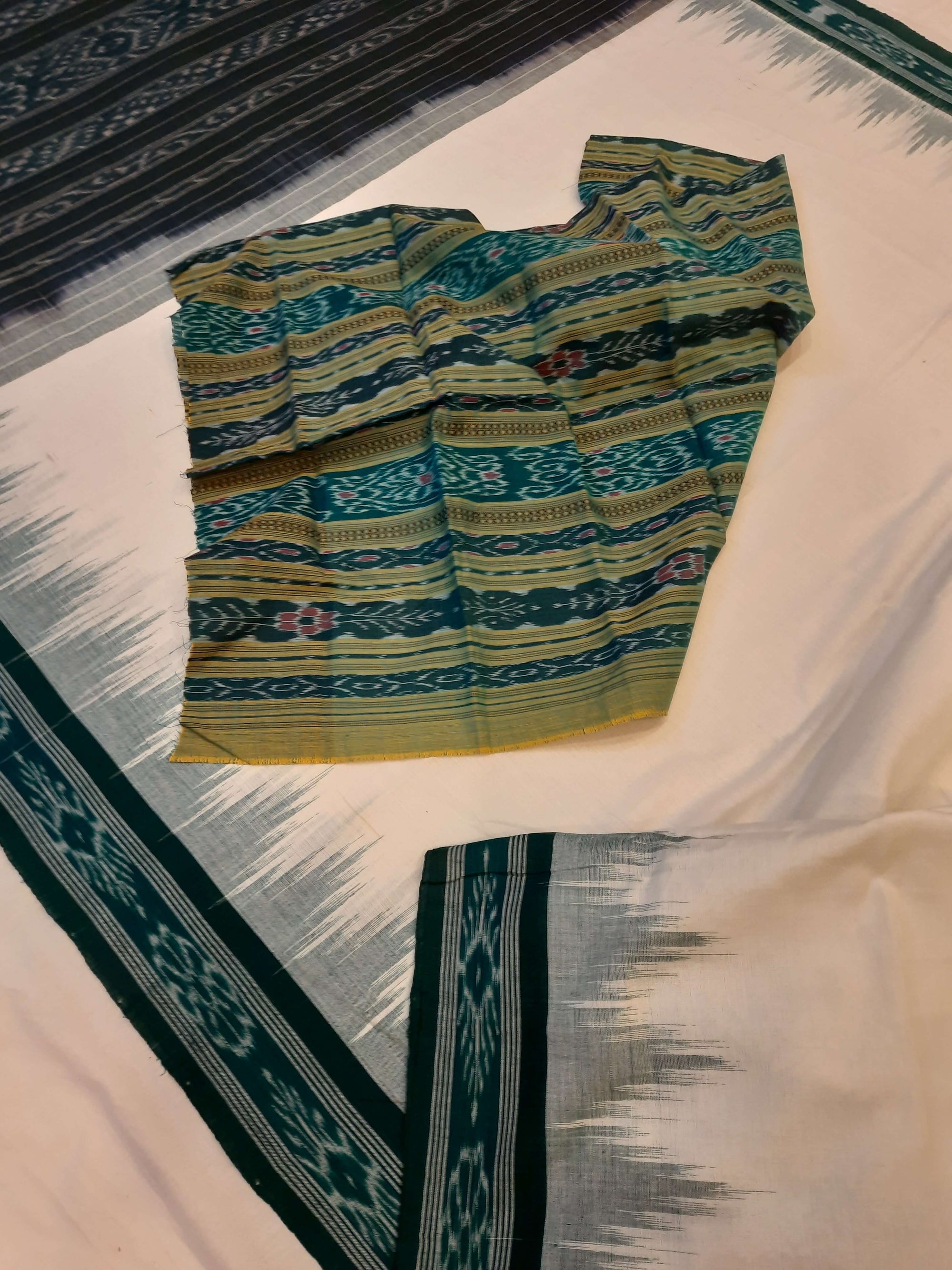 White with Green Odisha Ikat saree with cotton ikat blouse piece