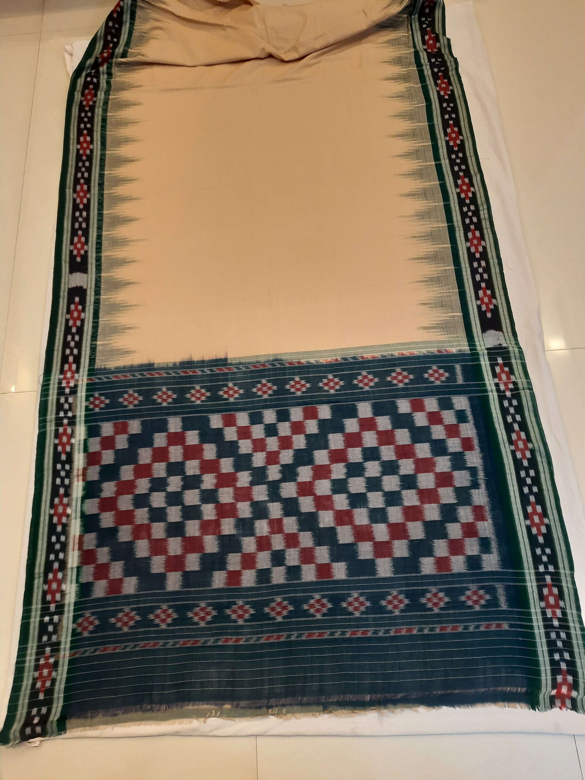 Beige with Green Cotton Odisha Ikat saree with cotton ikat blouse piece