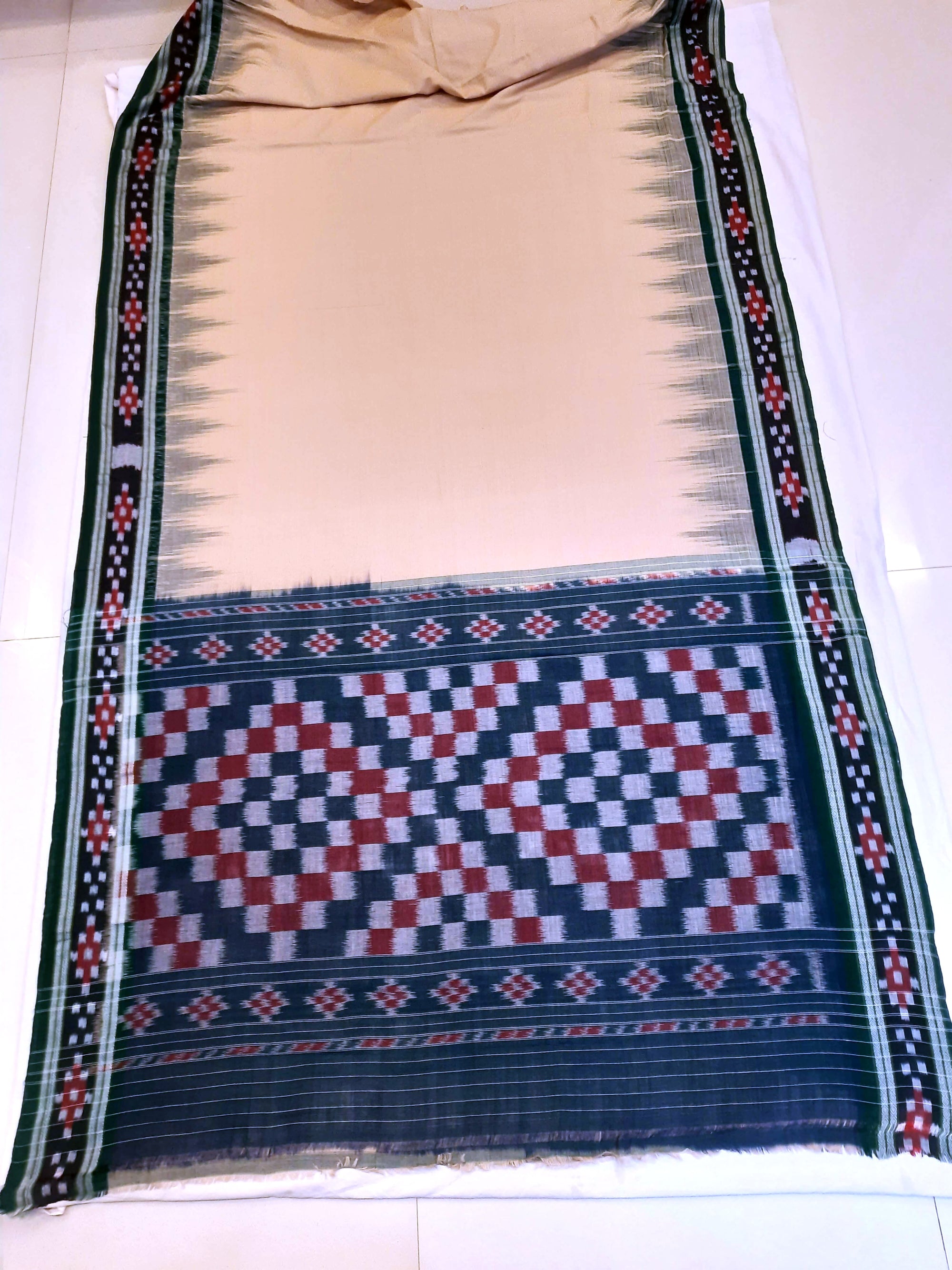 Beige with Green Cotton Odisha Ikat saree with cotton ikat blouse piece