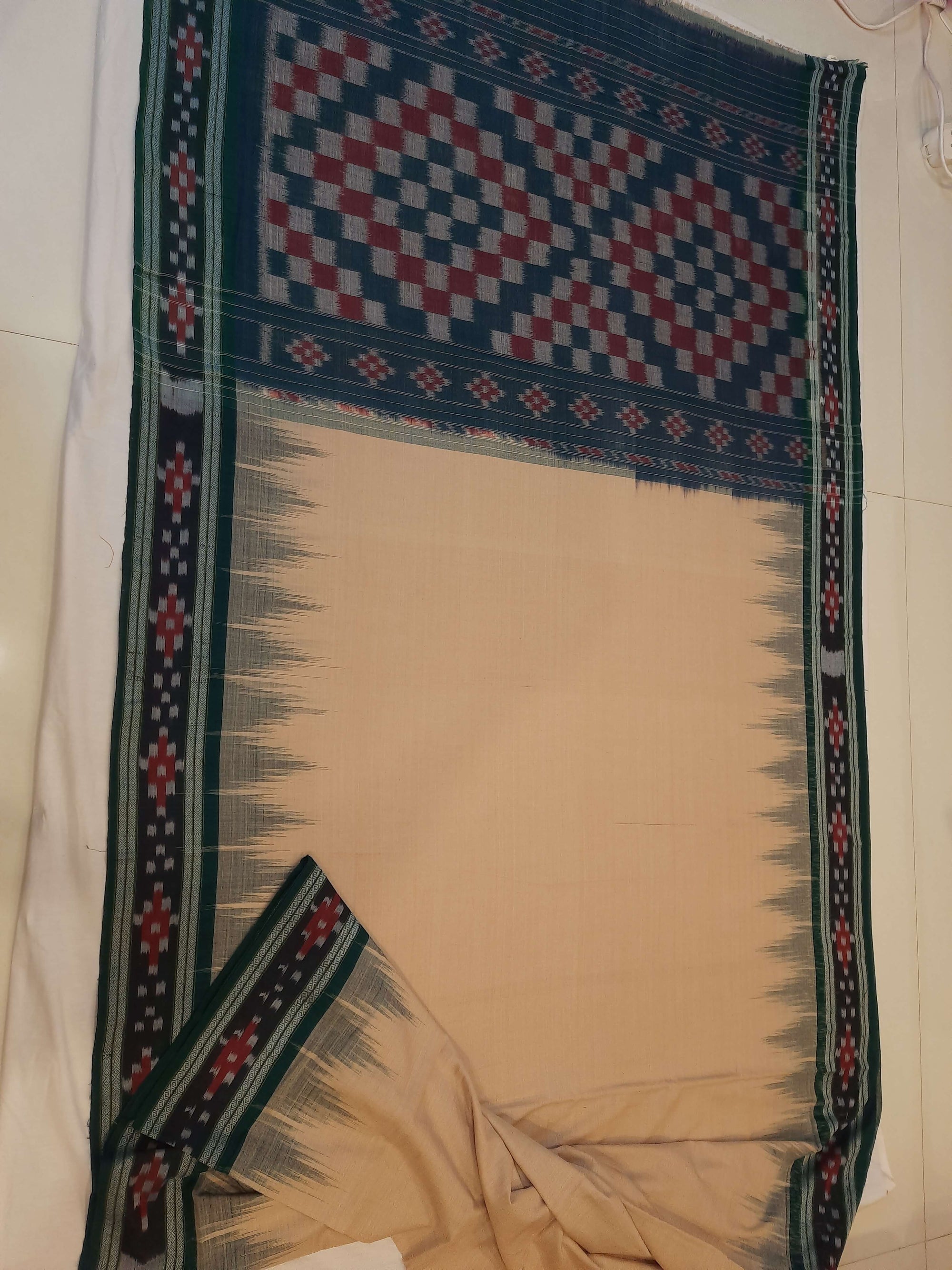 Beige with Green Cotton Odisha Ikat saree with cotton ikat blouse piece