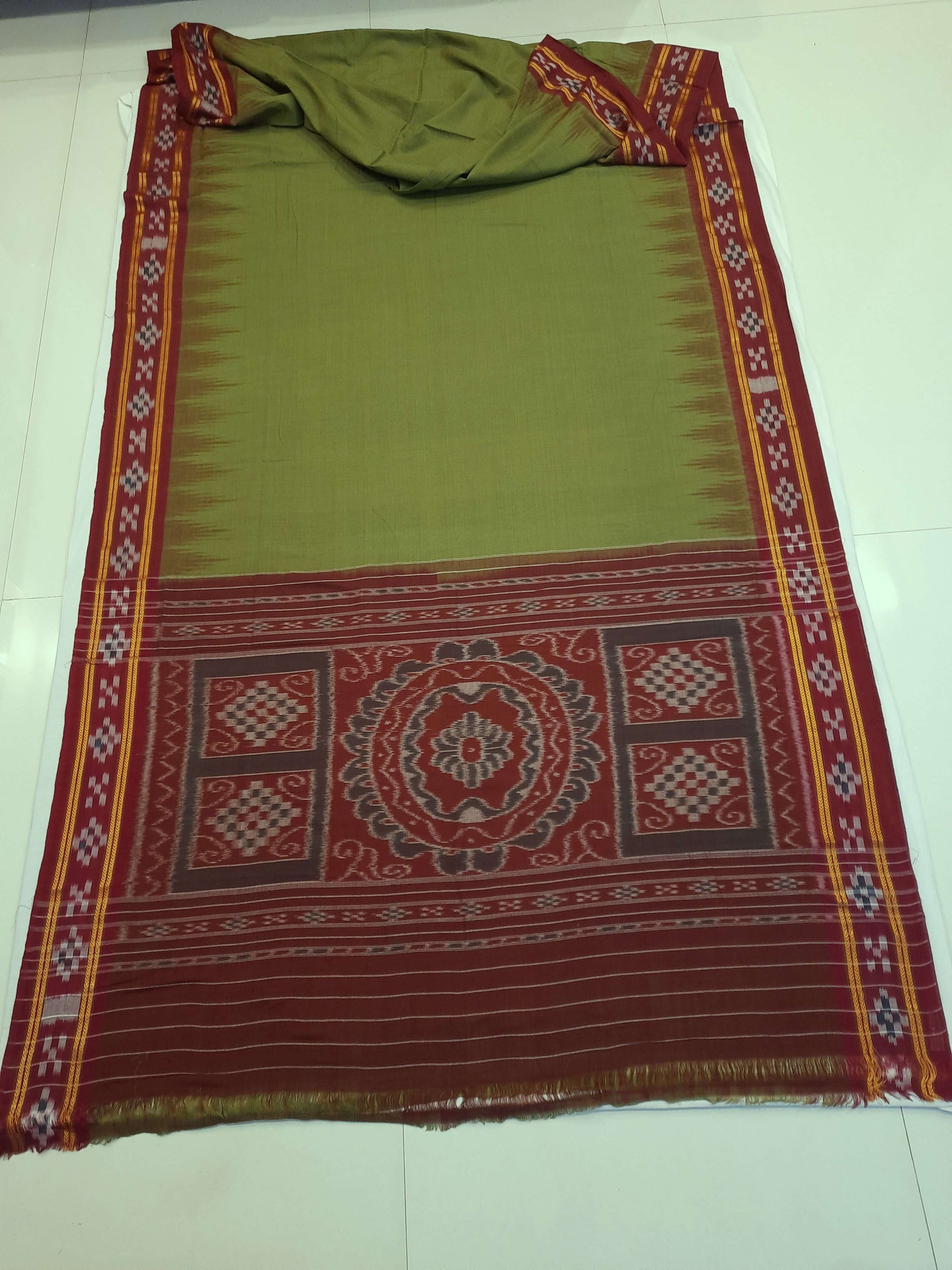Olive Green Odisha Ikat saree with cotton ikat blouse piece