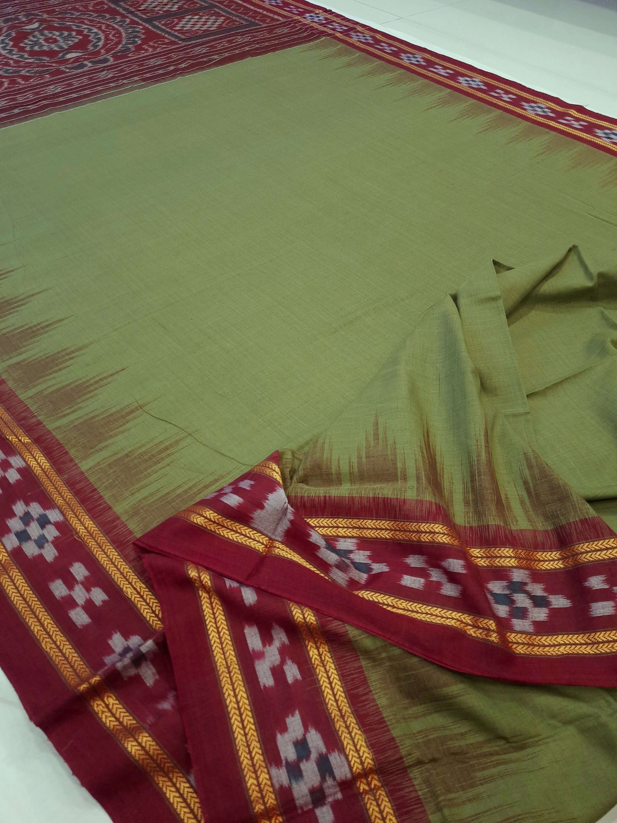 Olive Green Odisha Ikat saree with cotton ikat blouse piece