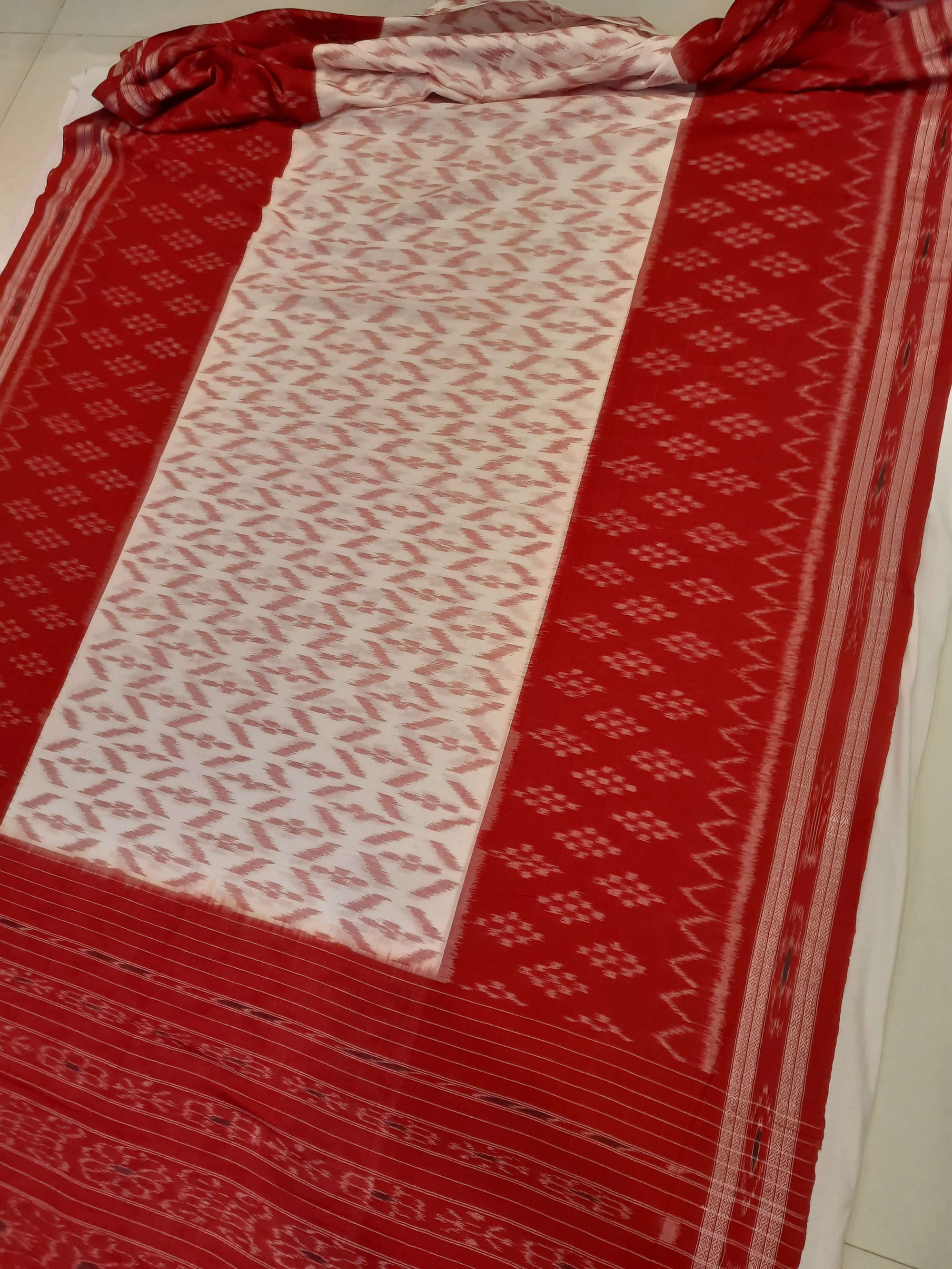 White Red wide border Cotton Odisha Ikat saree with mix match cotton ikat blouse piece