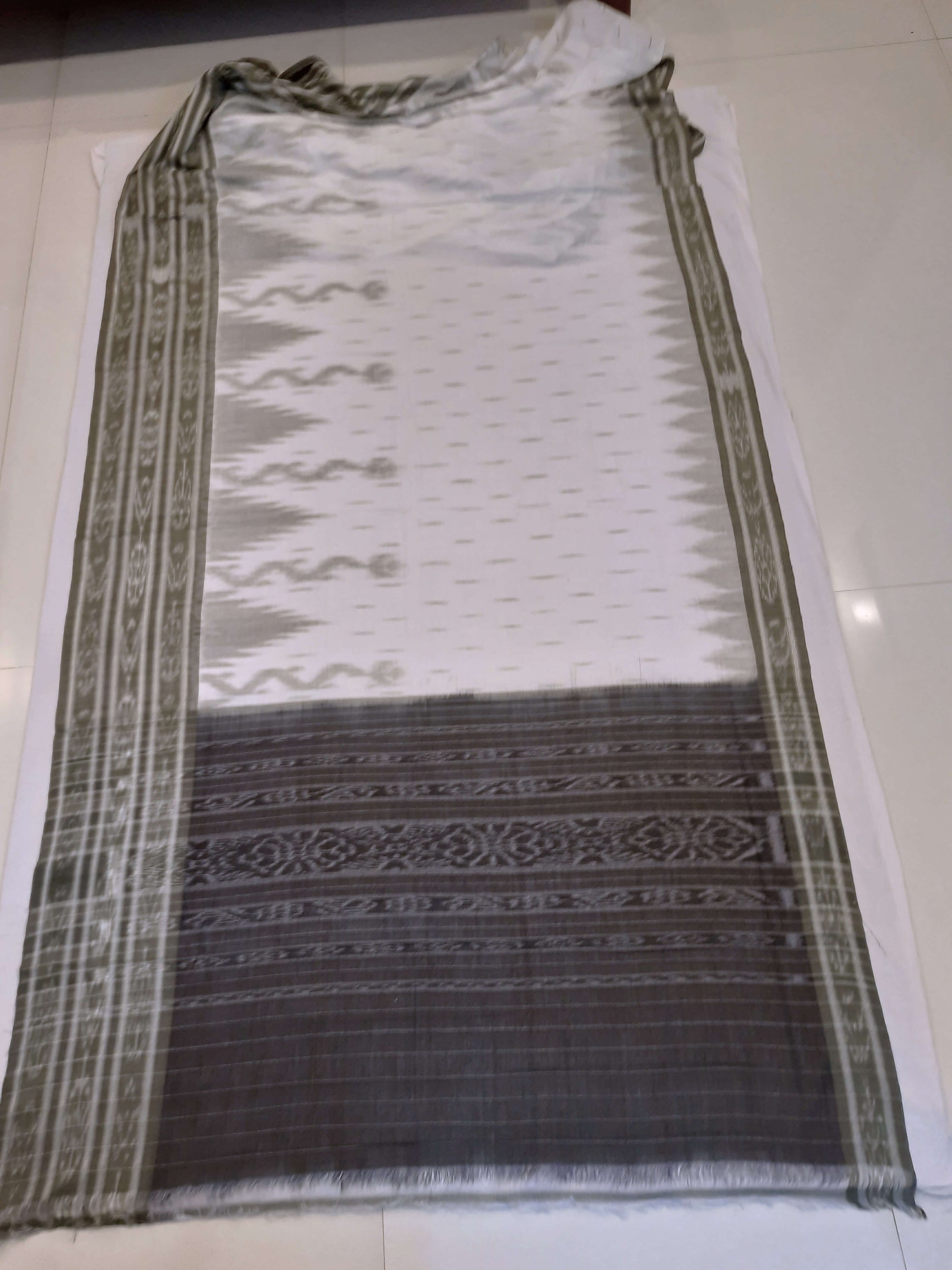 White wide border Cotton Odisha Ikat saree with mix match cotton ikat blouse