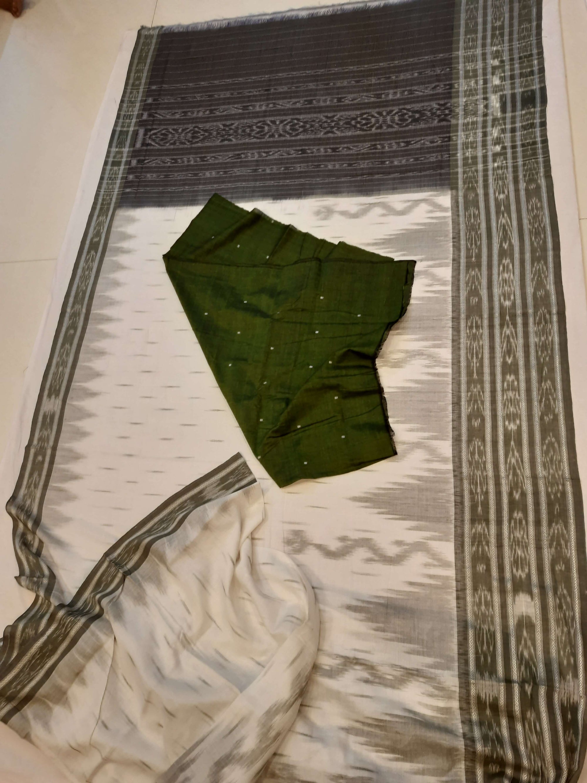 White wide border Cotton Odisha Ikat saree with mix match cotton ikat blouse