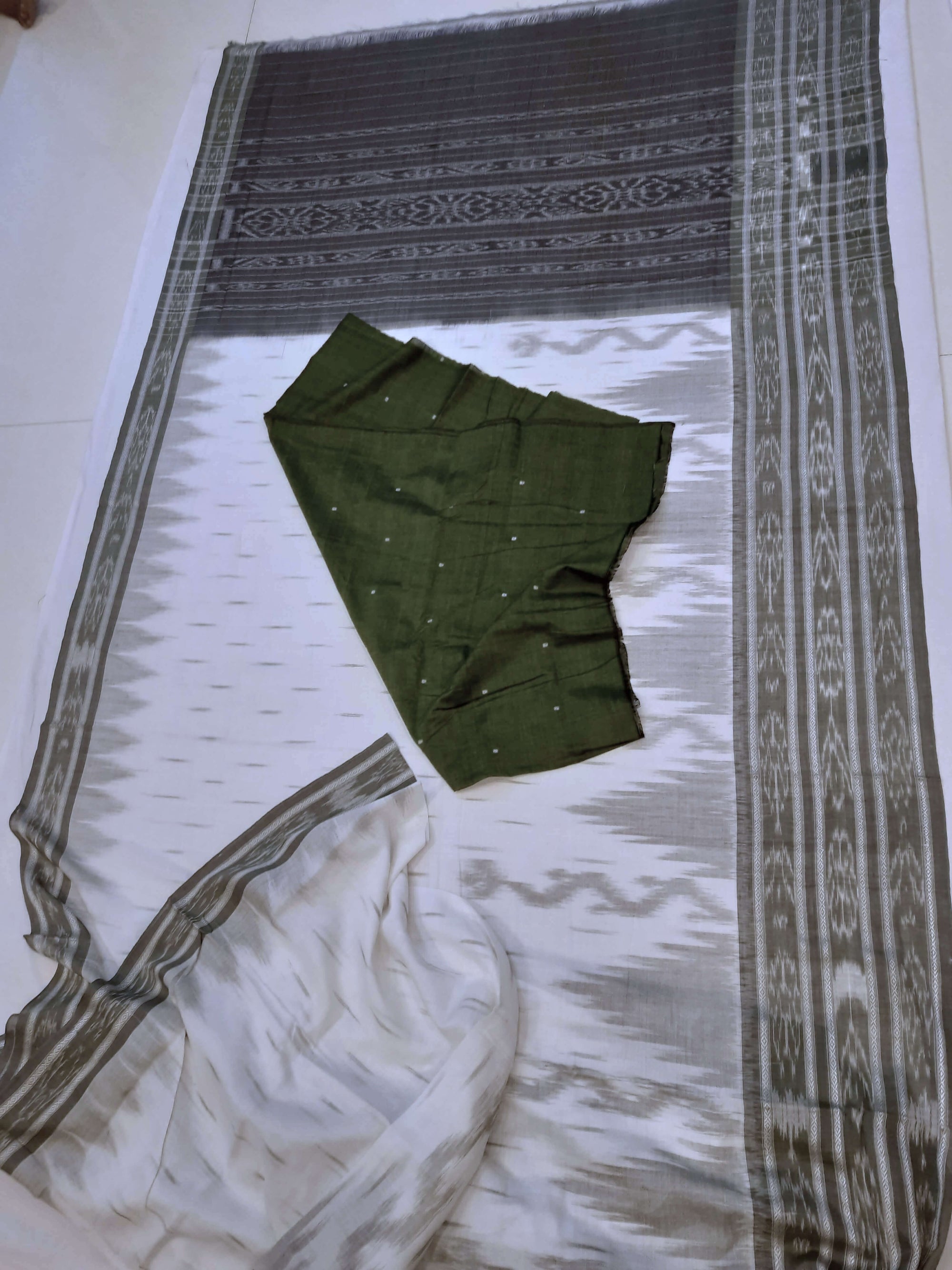 White wide border Cotton Odisha Ikat saree with mix match cotton ikat blouse