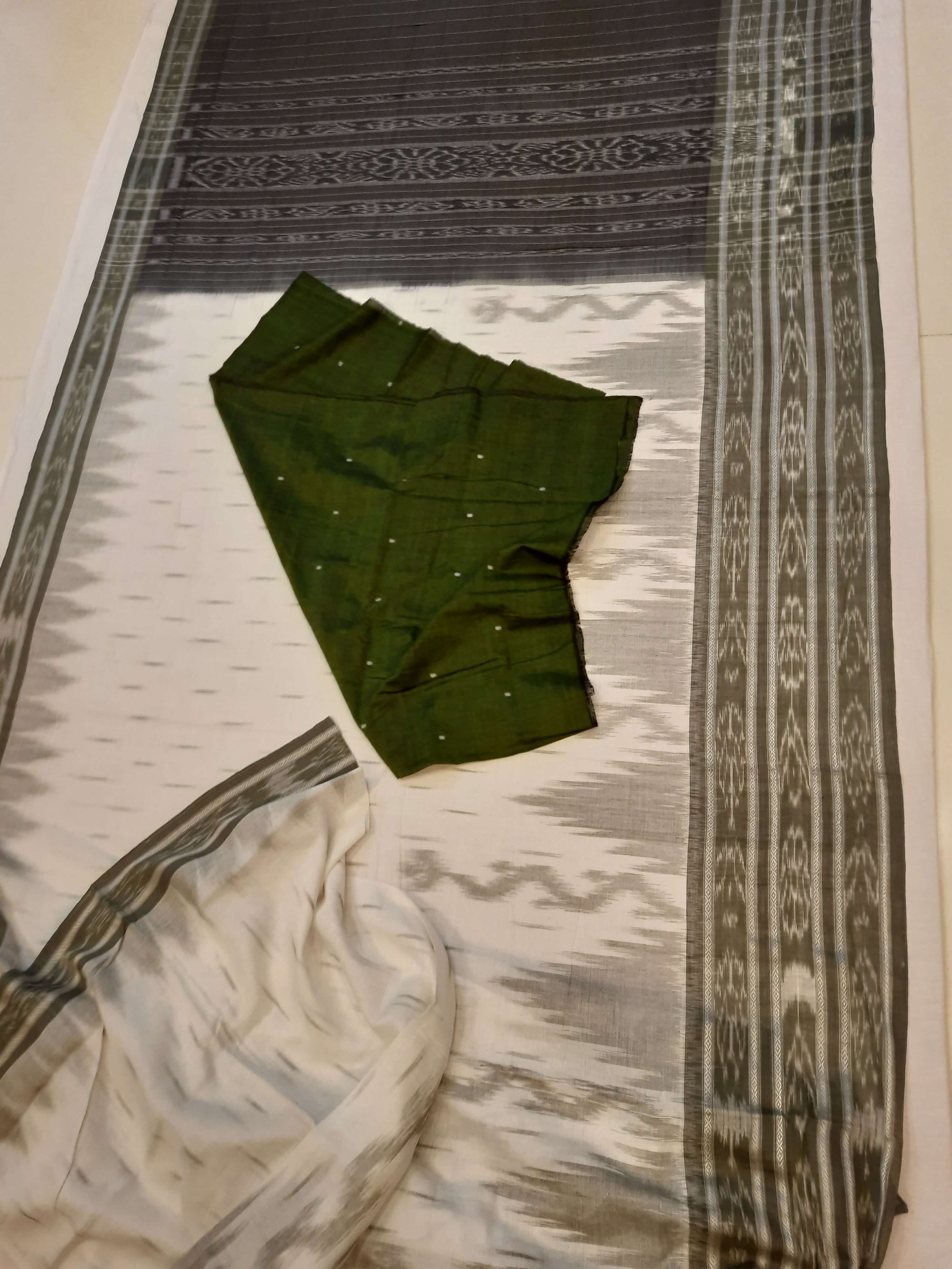 White wide border Cotton Odisha Ikat saree with mix match cotton ikat blouse