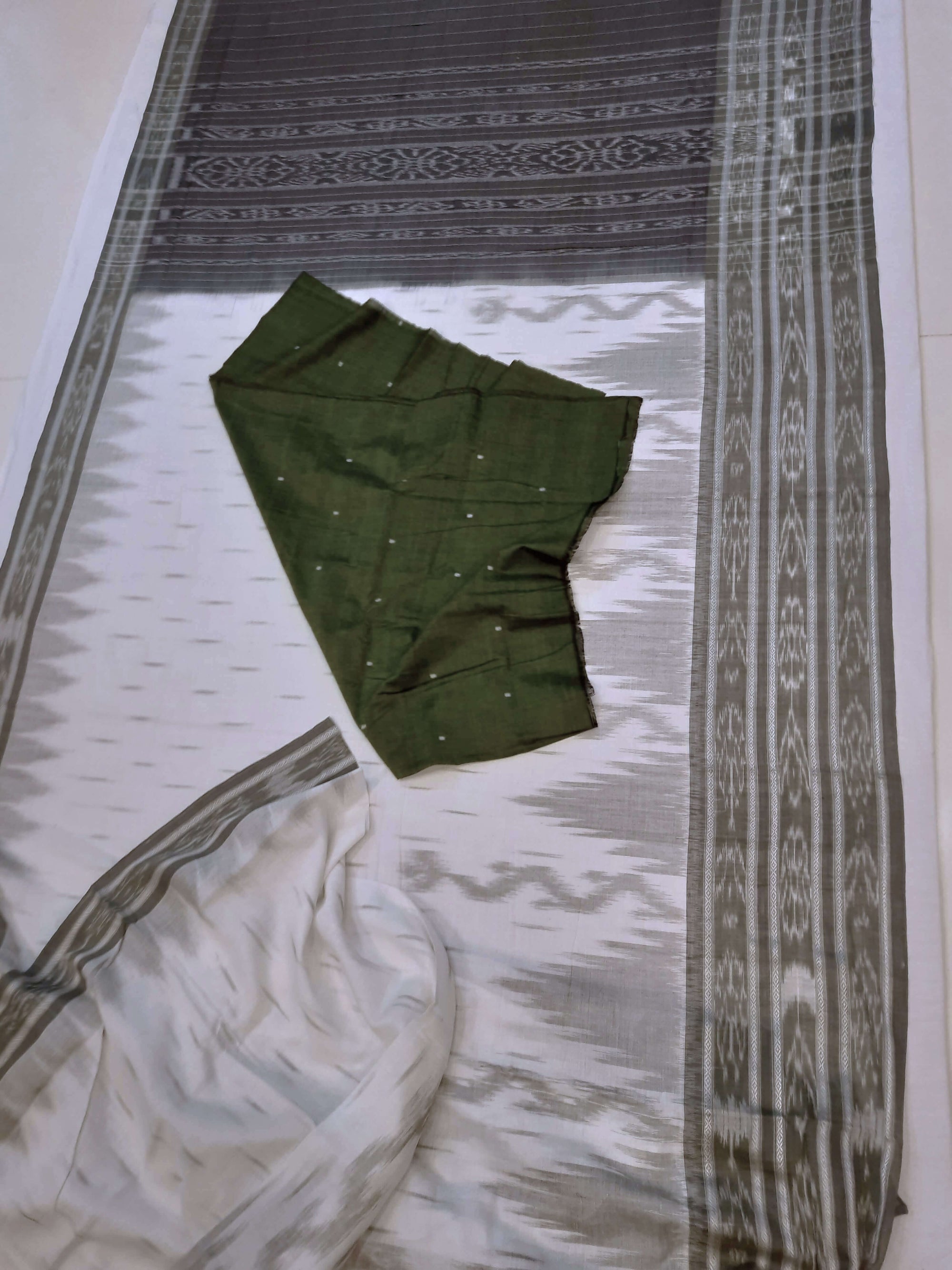 White wide border Cotton Odisha Ikat saree with mix match cotton ikat blouse