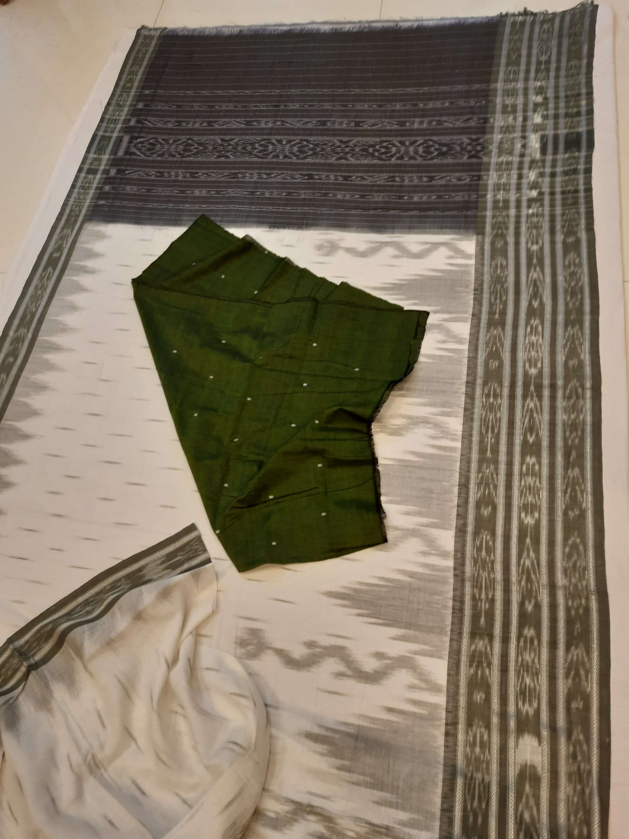 White wide border Cotton Odisha Ikat saree with mix match cotton ikat blouse