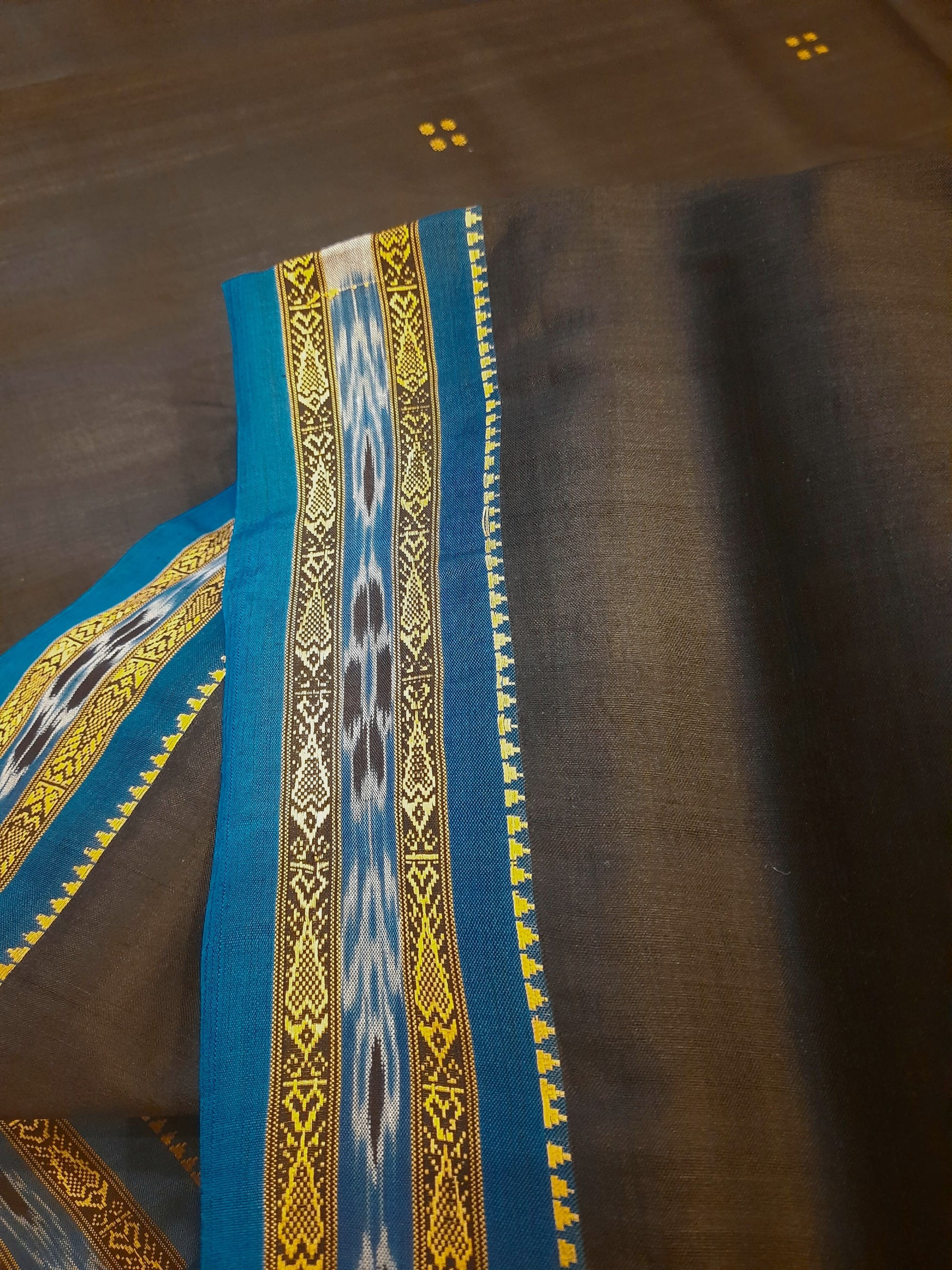 Black with Blue Fish motif Odisha Khandua Patta Silk Saree paired with cotton ikat blouse piece