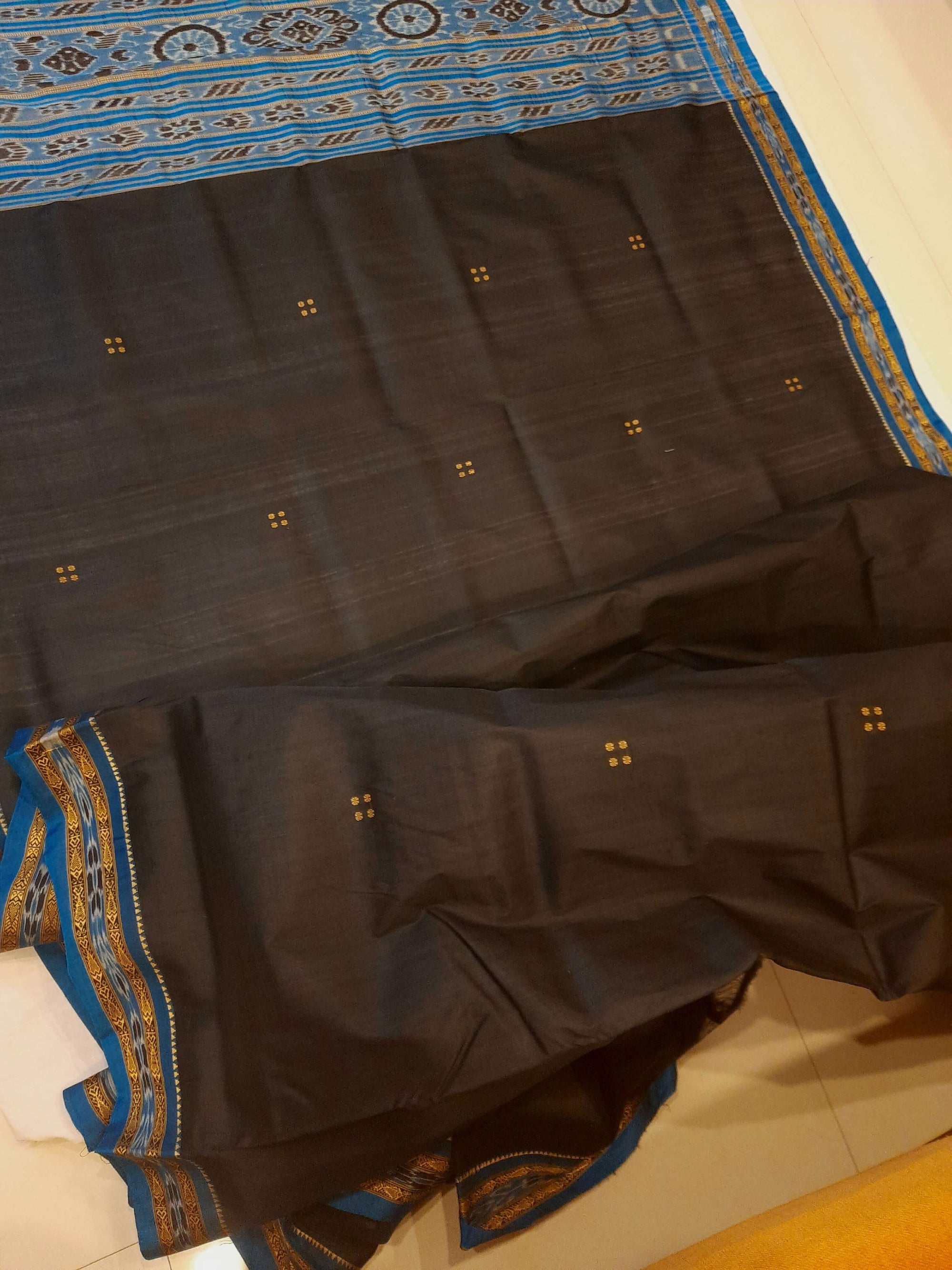 Black with Blue Fish motif Odisha Khandua Patta Silk Saree paired with cotton ikat blouse piece