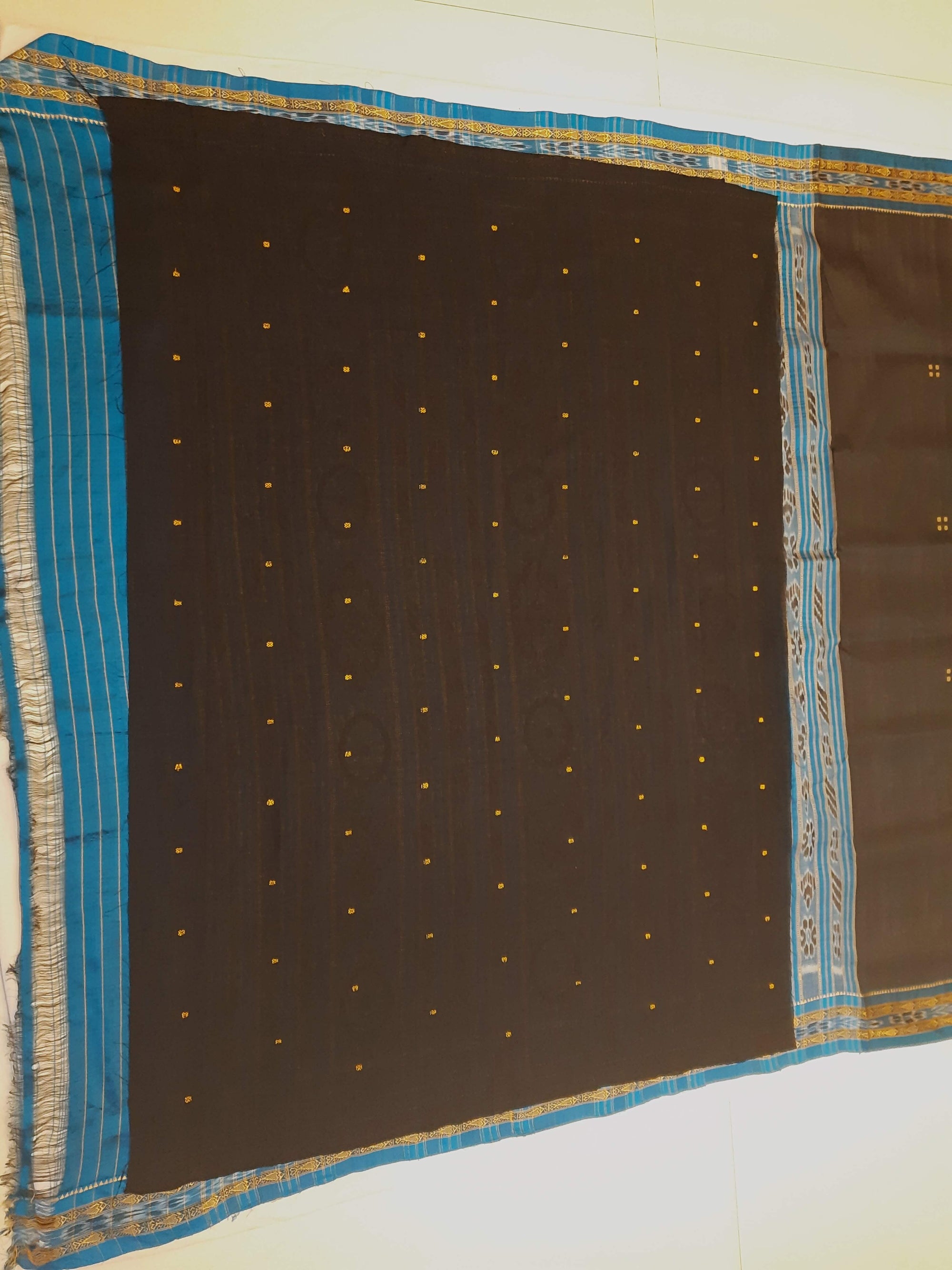 Black with Blue Fish motif Odisha Khandua Patta Silk Saree paired with cotton ikat blouse piece
