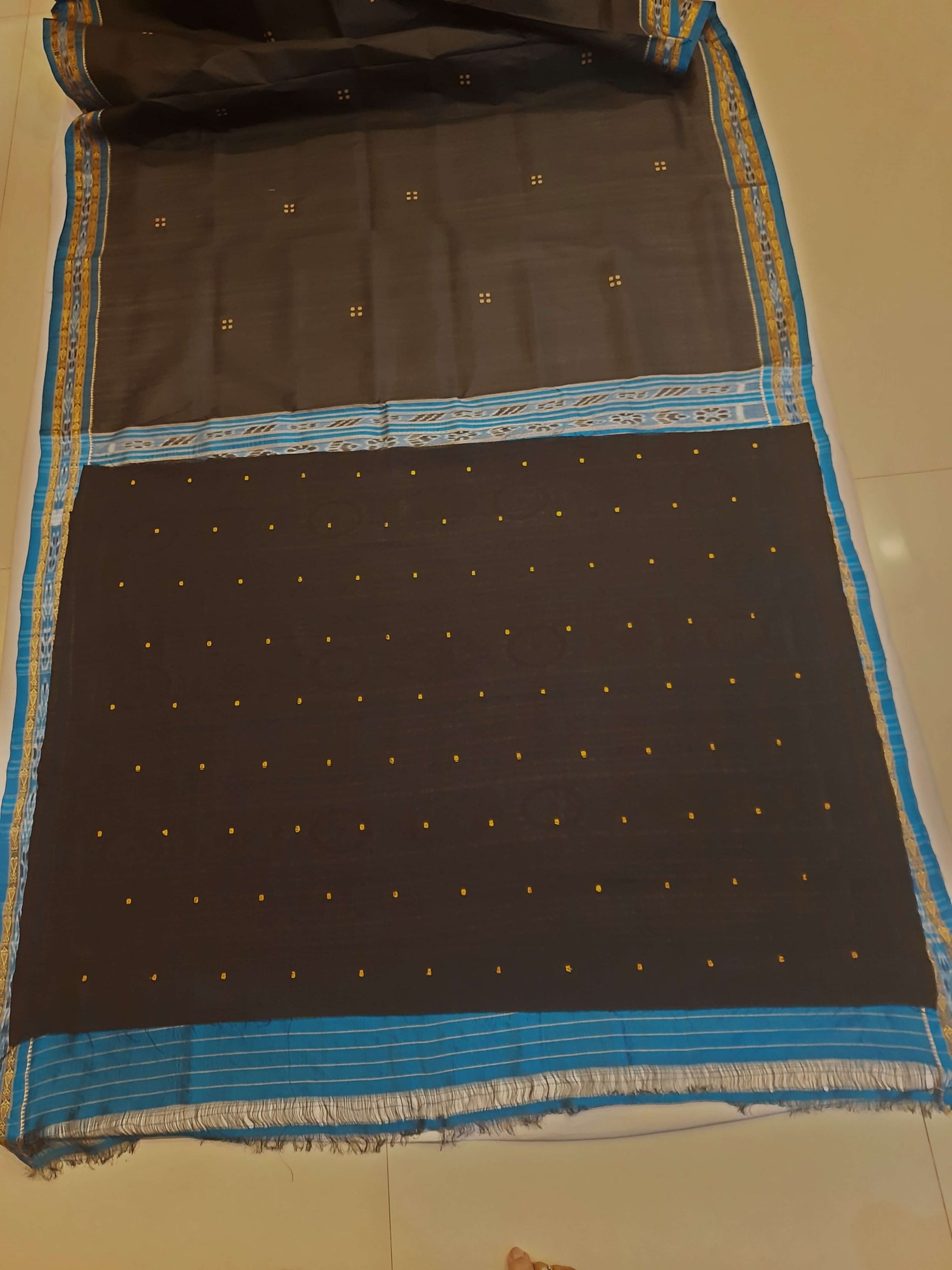 Black with Blue Fish motif Odisha Khandua Patta Silk Saree paired with cotton ikat blouse piece