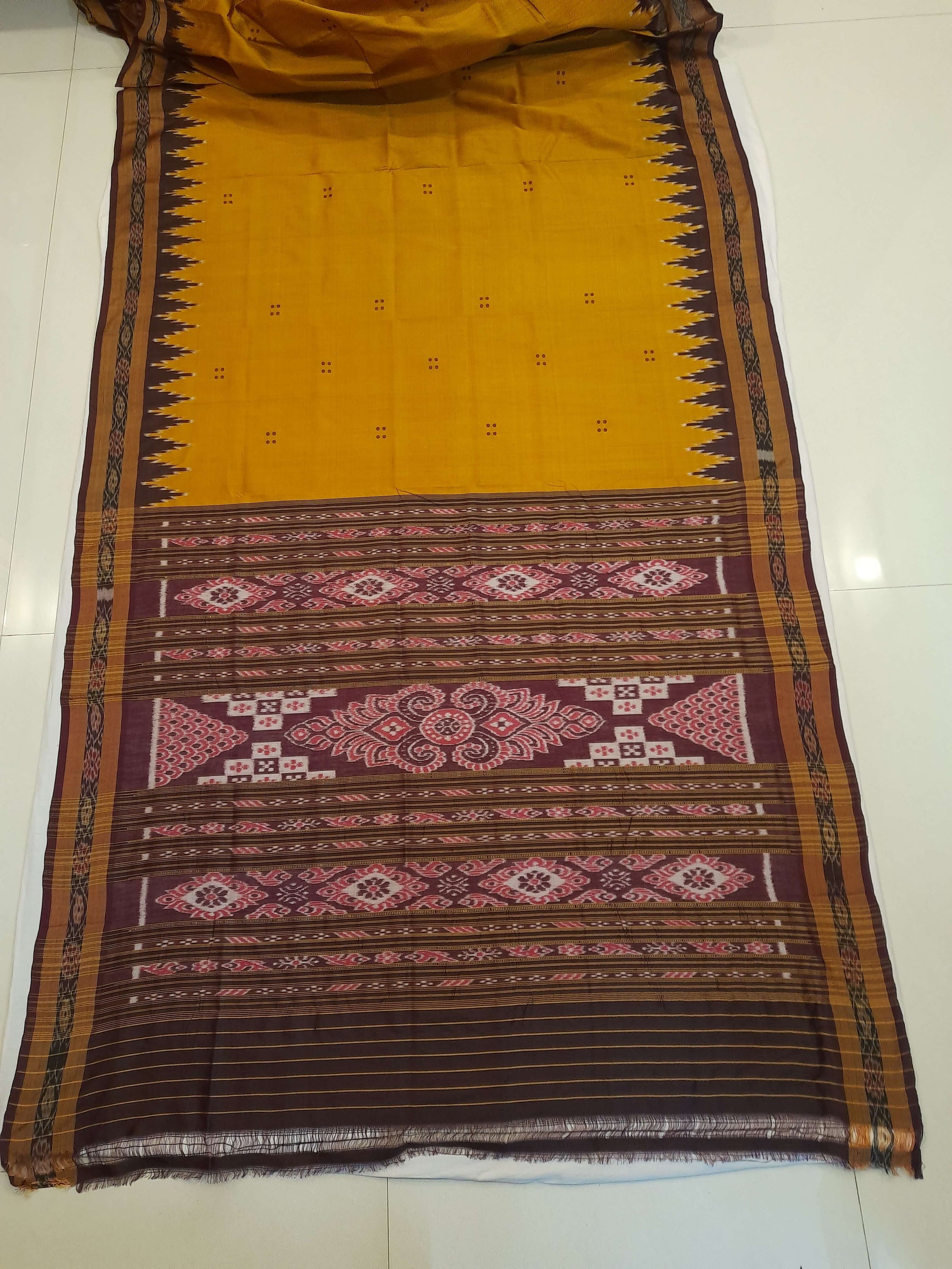 Golden Odisha Khandua Patta Silk Saree paired with cotton ikat blouse piece