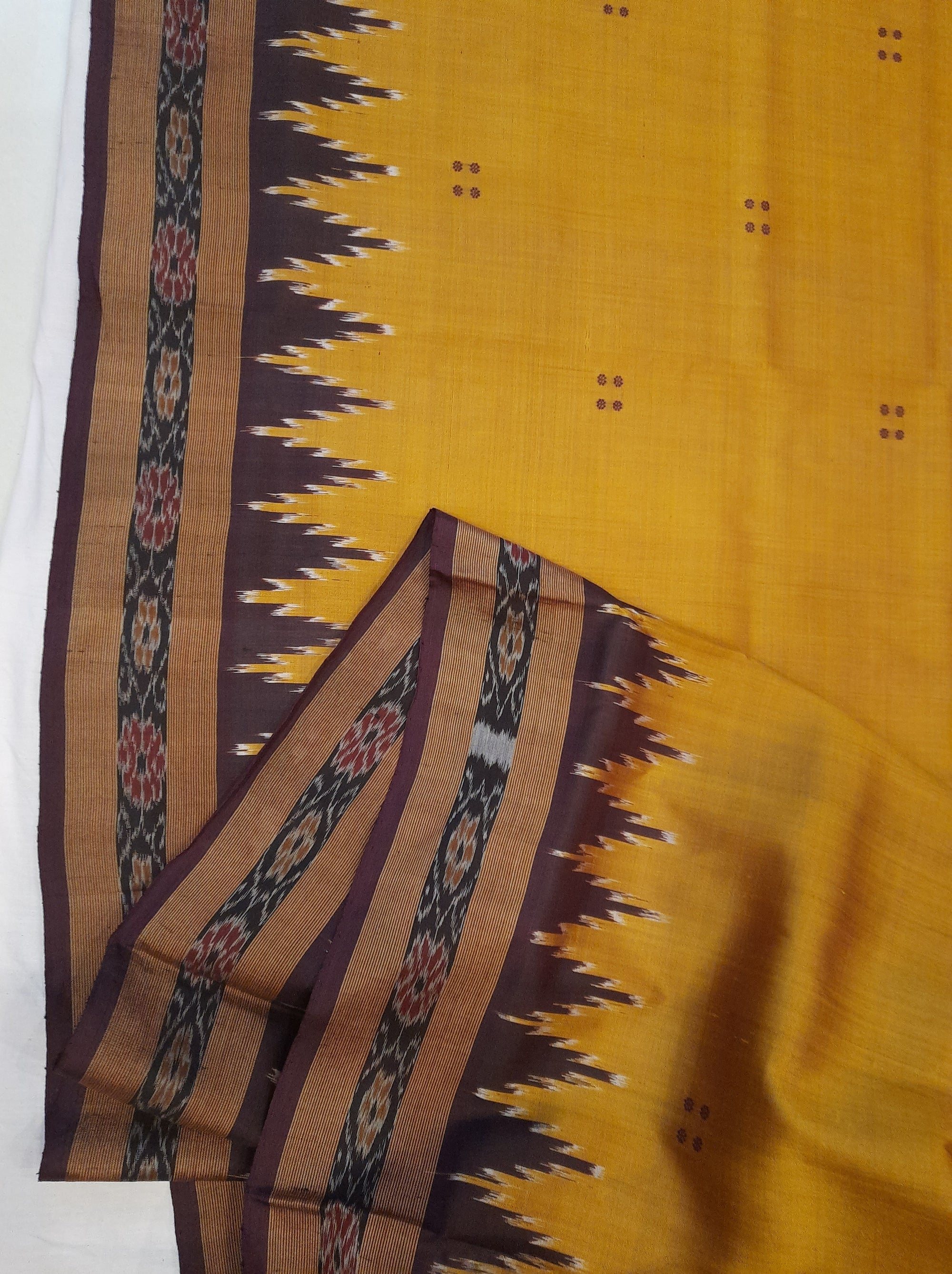 Golden Odisha Khandua Patta Silk Saree paired with cotton ikat blouse piece