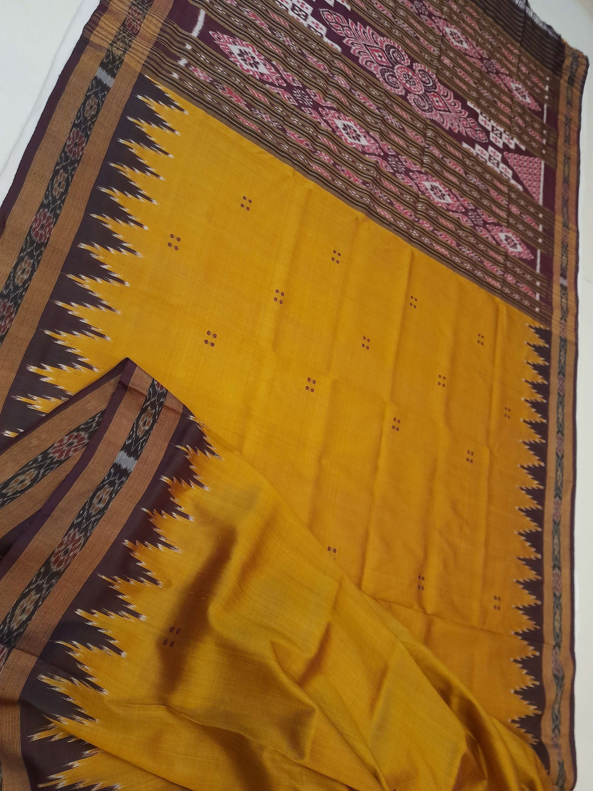 Golden Odisha Khandua Patta Silk Saree paired with cotton ikat blouse piece