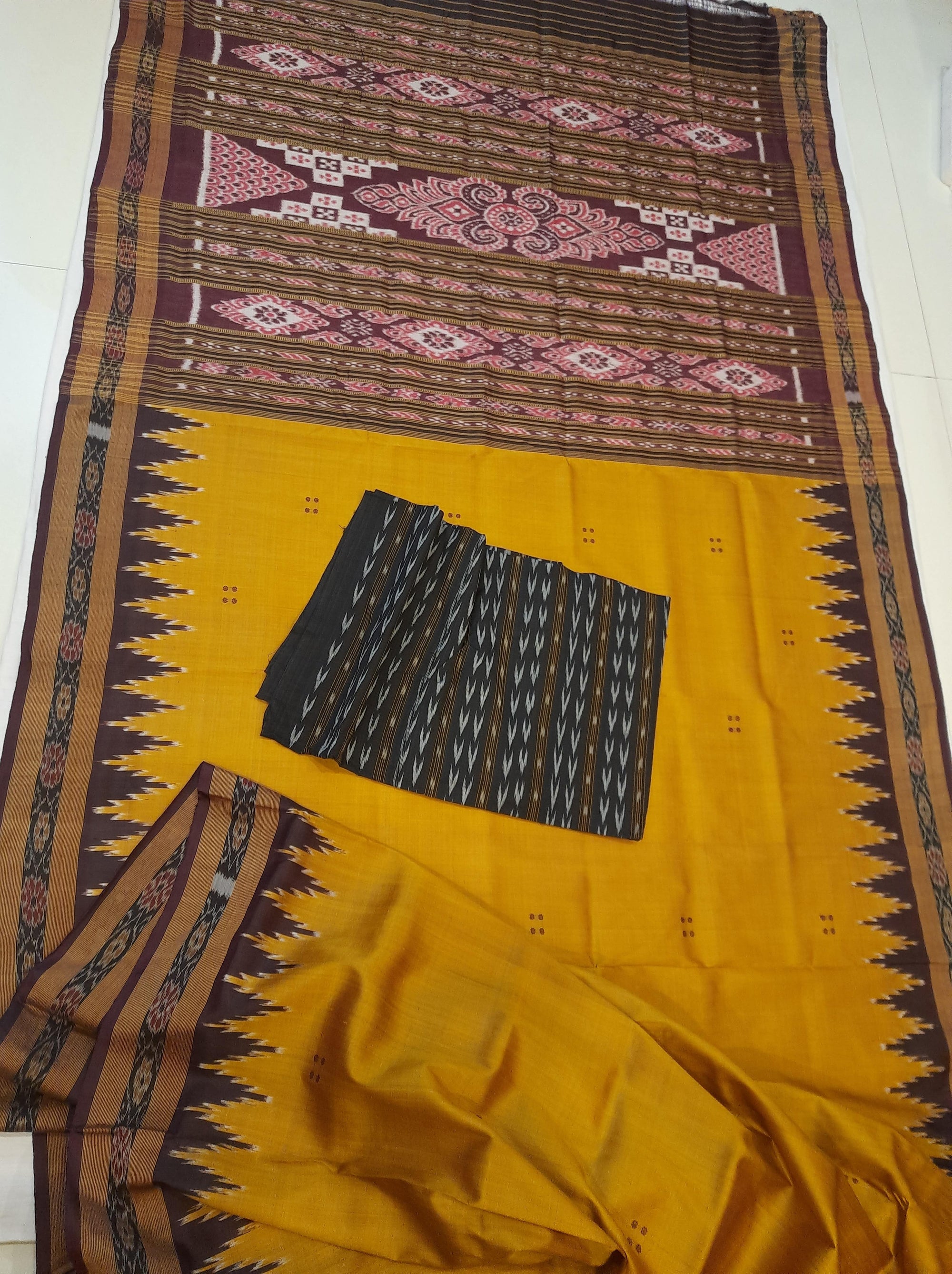 Golden Odisha Khandua Patta Silk Saree paired with cotton ikat blouse piece