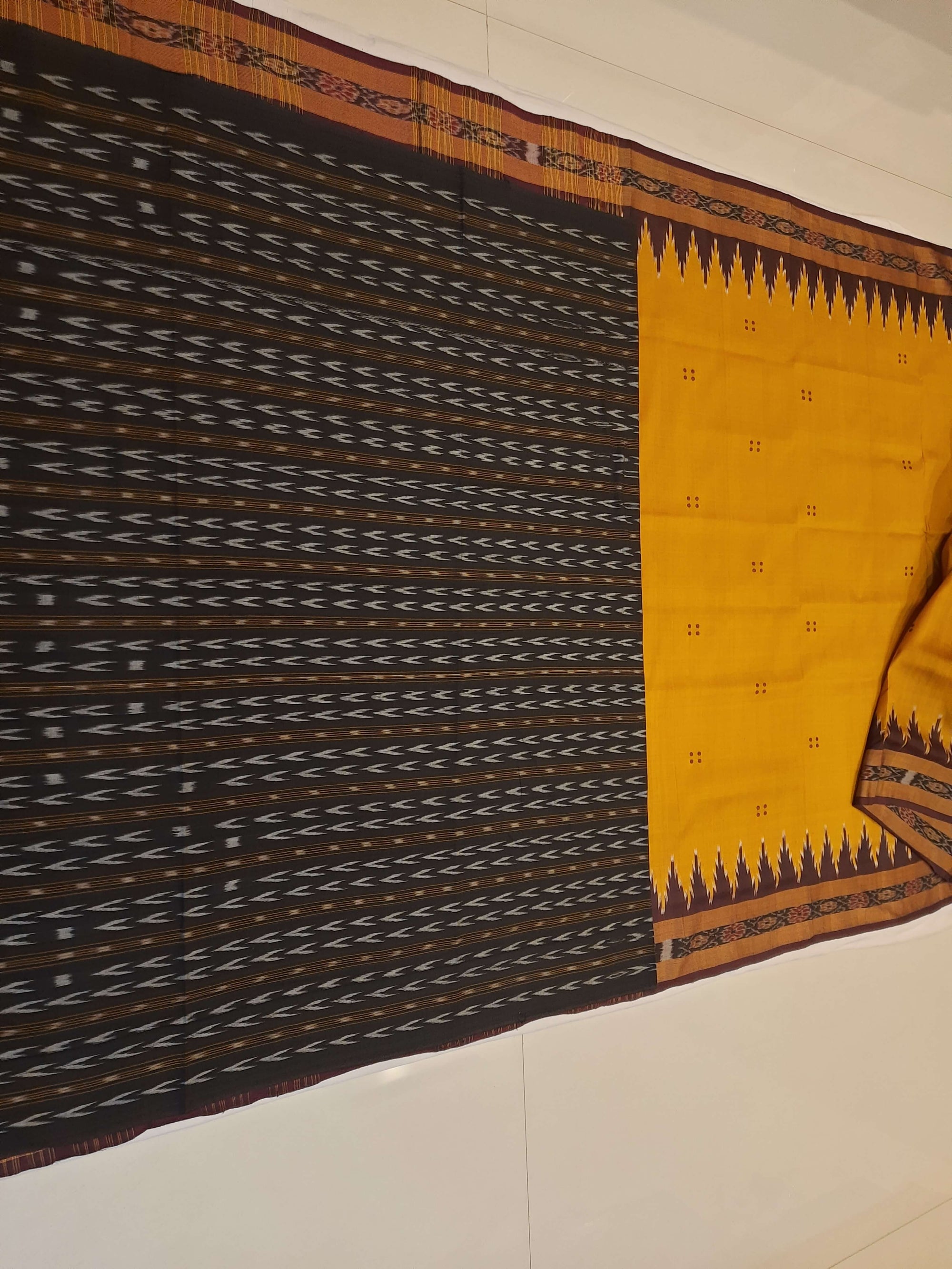 Golden Odisha Khandua Patta Silk Saree paired with cotton ikat blouse piece
