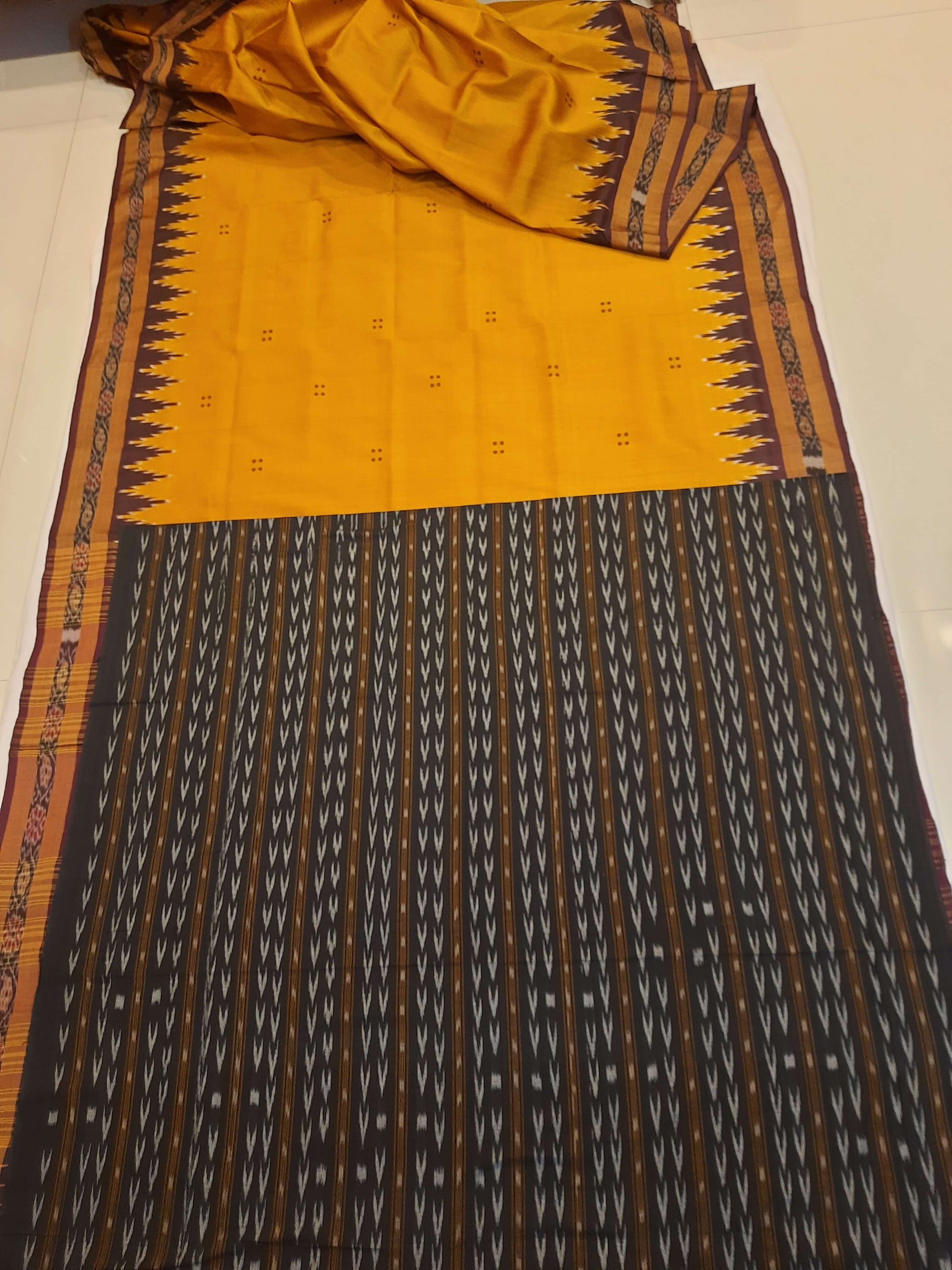 Golden Odisha Khandua Patta Silk Saree paired with cotton ikat blouse piece