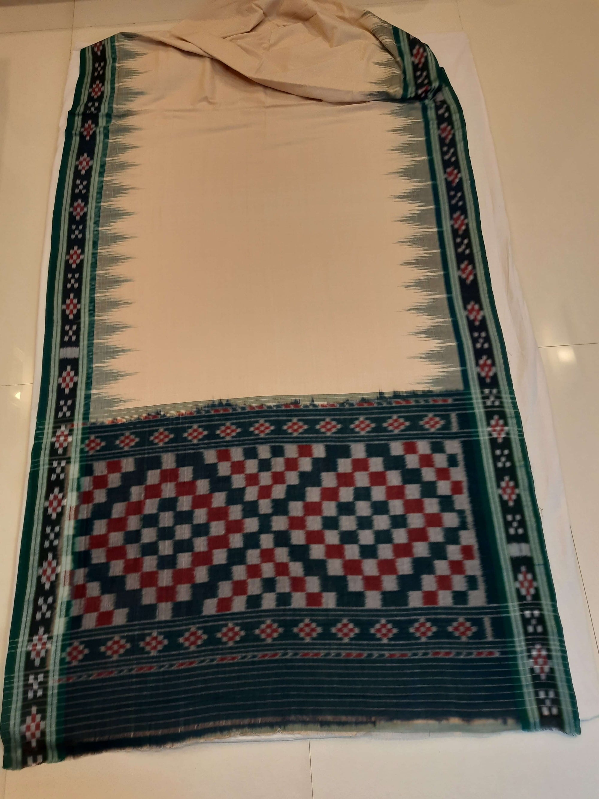 Beige with Green Cotton Odisha Ikat saree with cotton ikat blouse piece