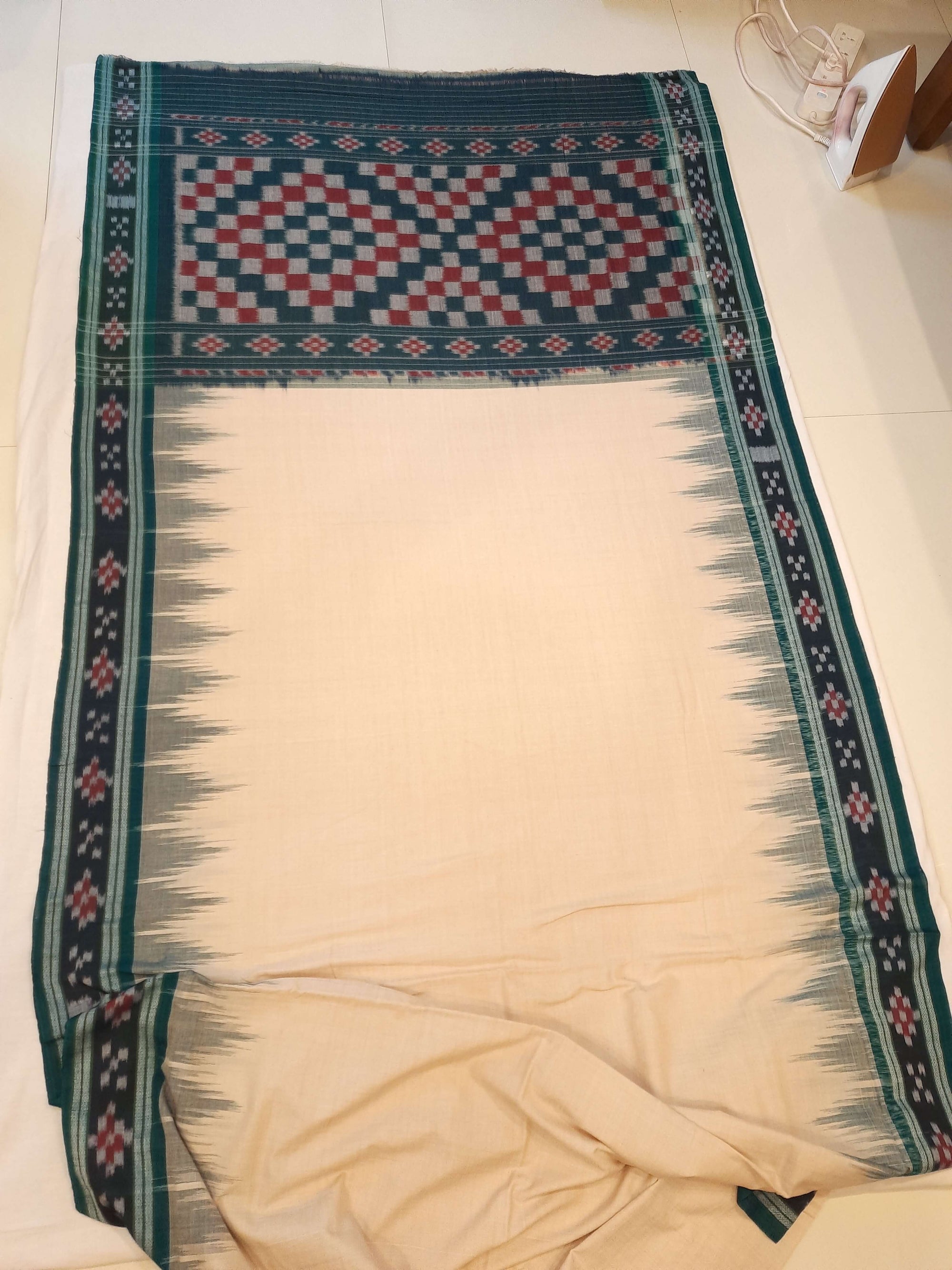 Beige with Green Cotton Odisha Ikat saree with cotton ikat blouse piece