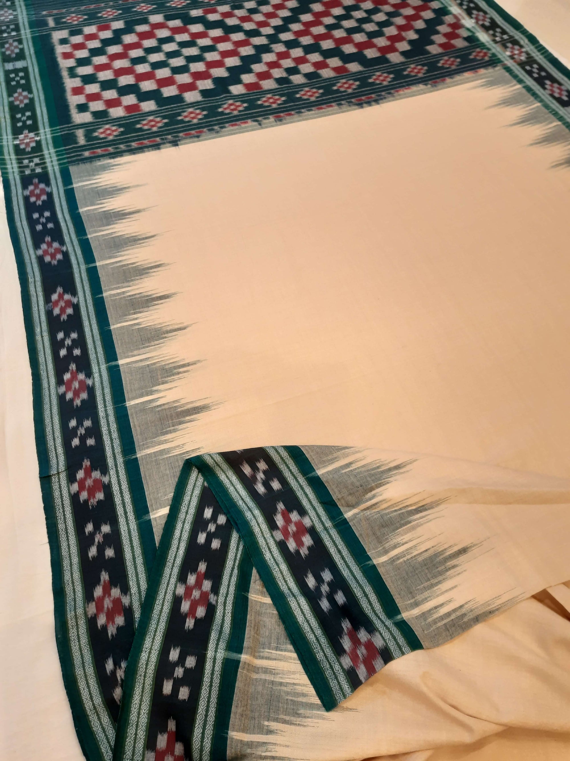 Beige with Green Cotton Odisha Ikat saree with cotton ikat blouse piece
