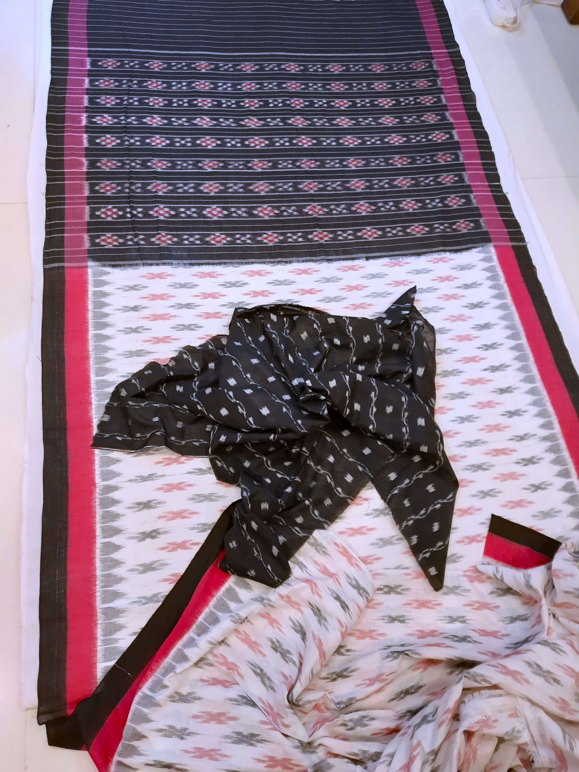 White with Pink and black Cotton Odisha Ikat saree with cotton ikat blouse piece