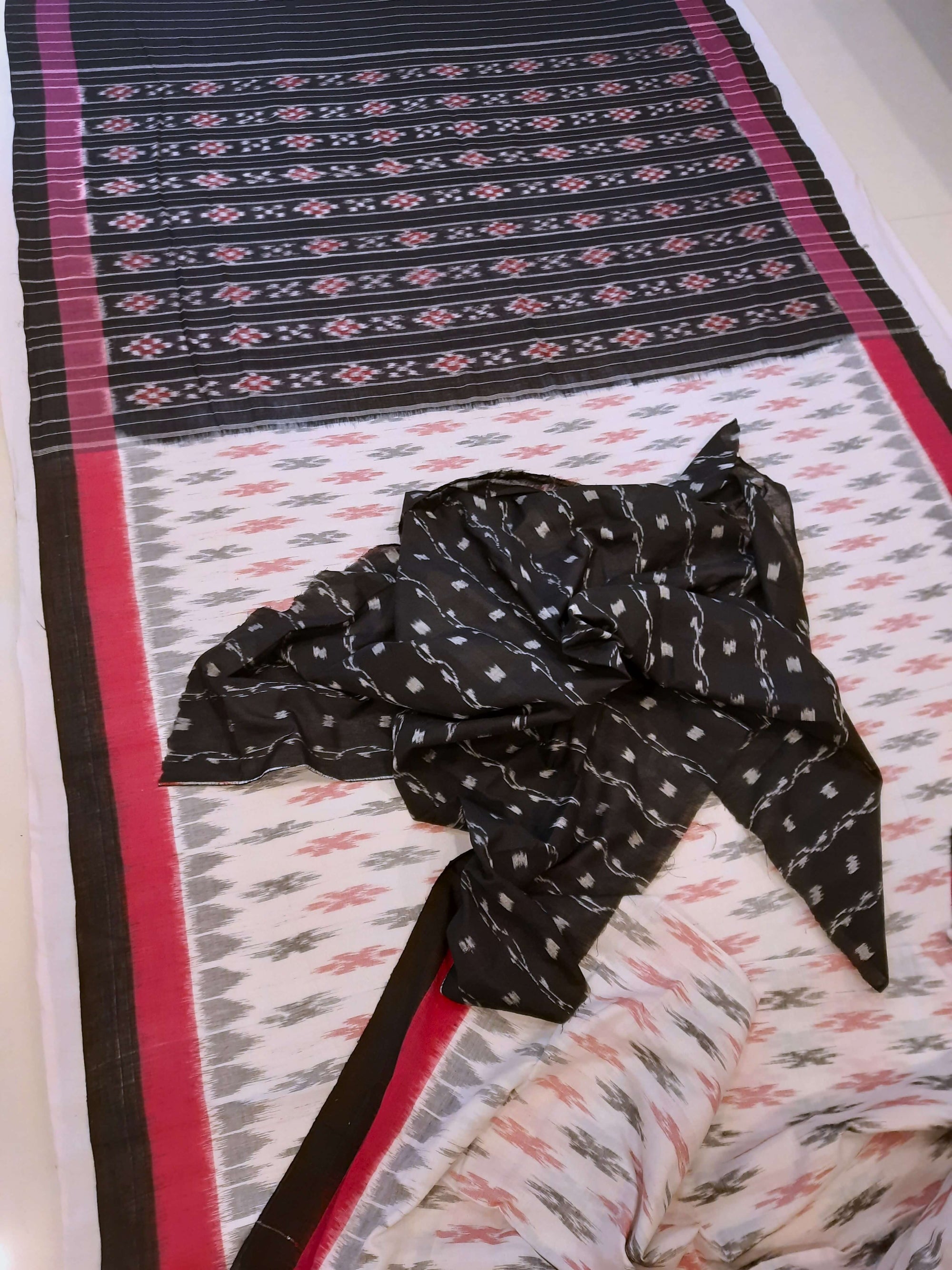 White with Pink and black Cotton Odisha Ikat saree with cotton ikat blouse piece