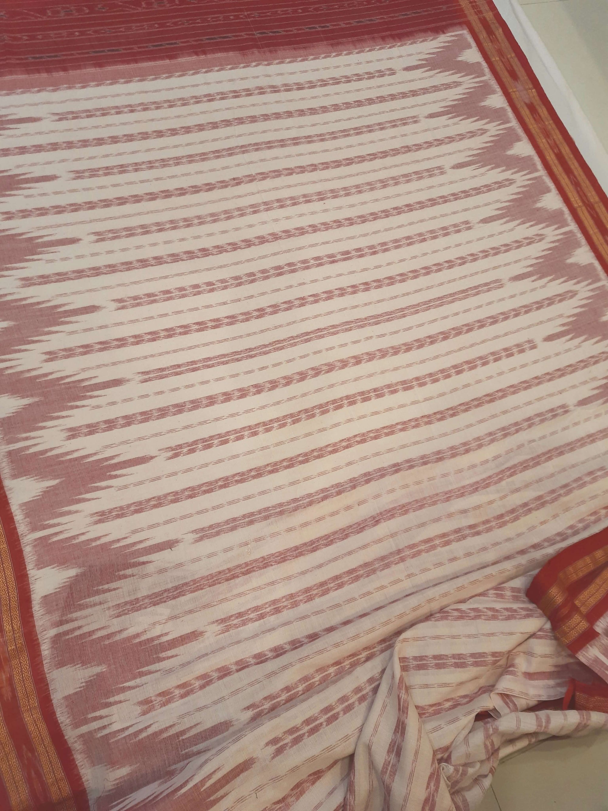 Off-white with Red Cotton Odisha Ikat saree with cotton ikat blouse piece