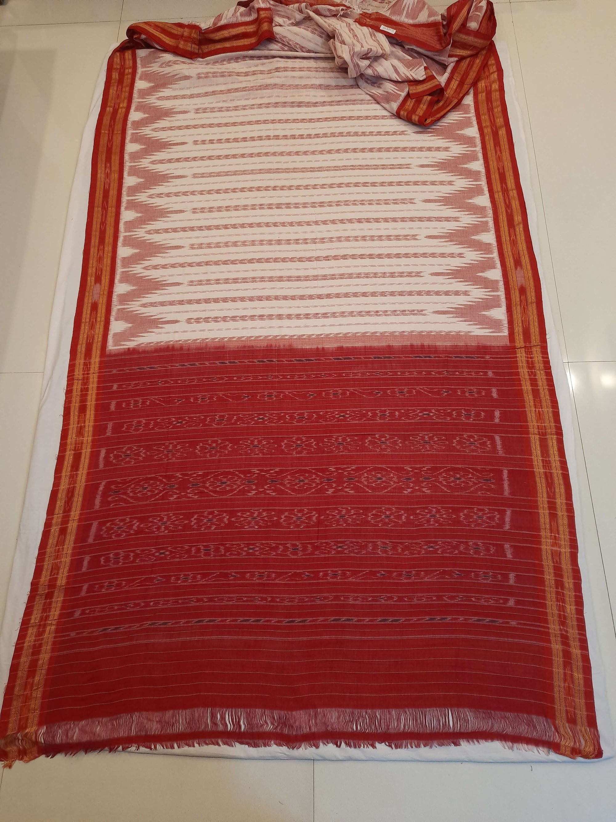 Off-white with Red Cotton Odisha Ikat saree with cotton ikat blouse piece