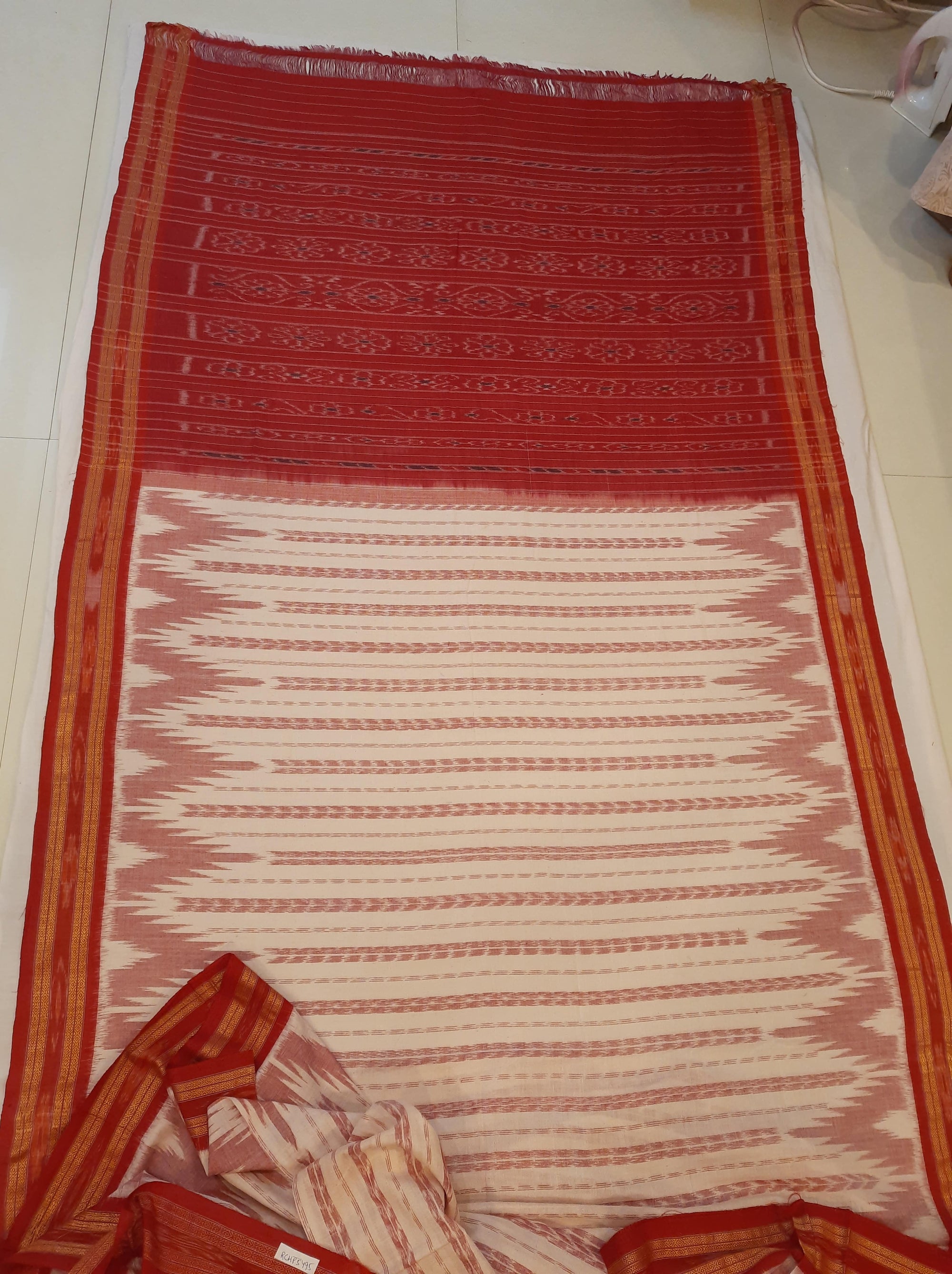 Off-white with Red Cotton Odisha Ikat saree with cotton ikat blouse piece