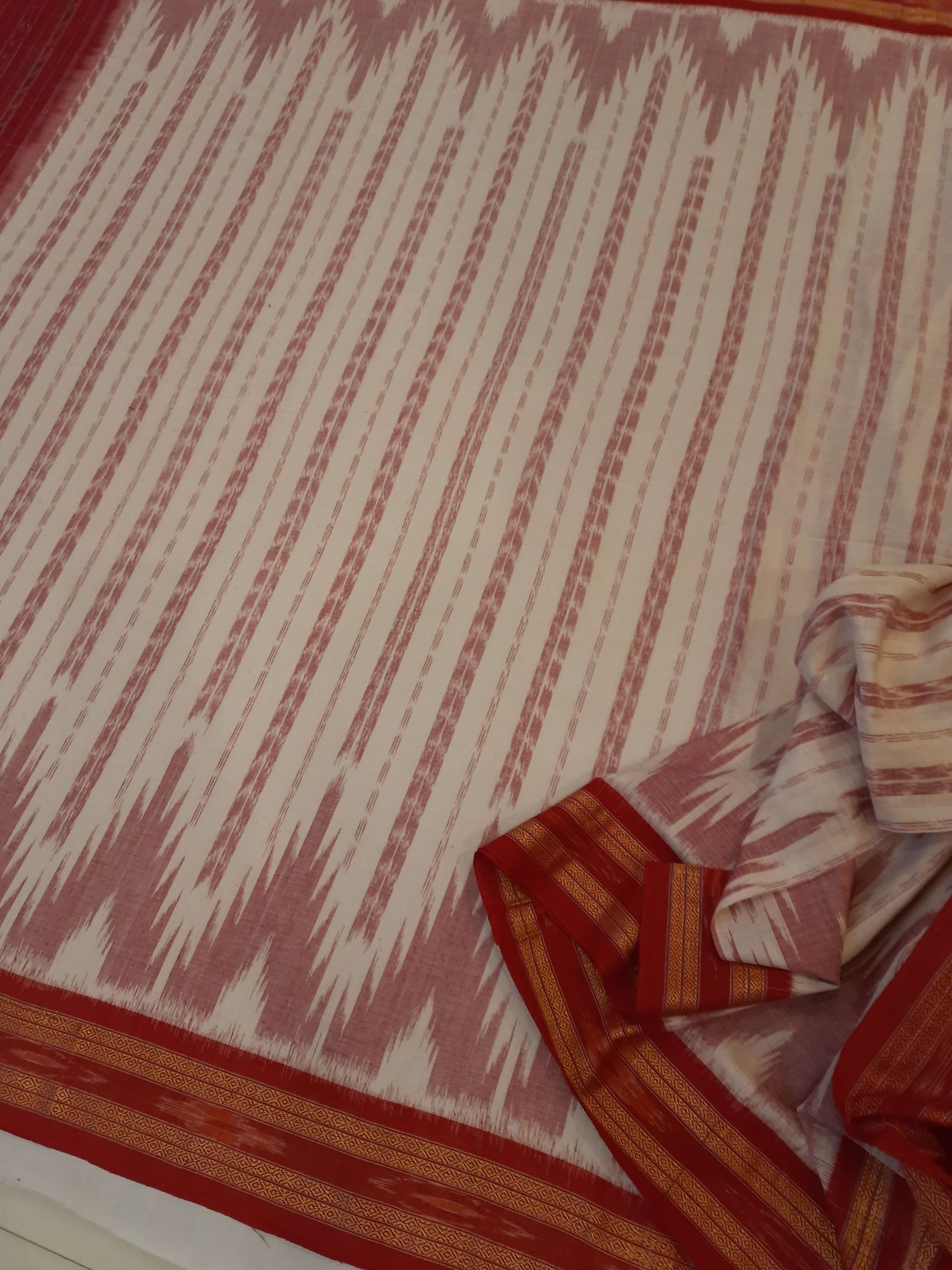 Off-white with Red Cotton Odisha Ikat saree with cotton ikat blouse piece