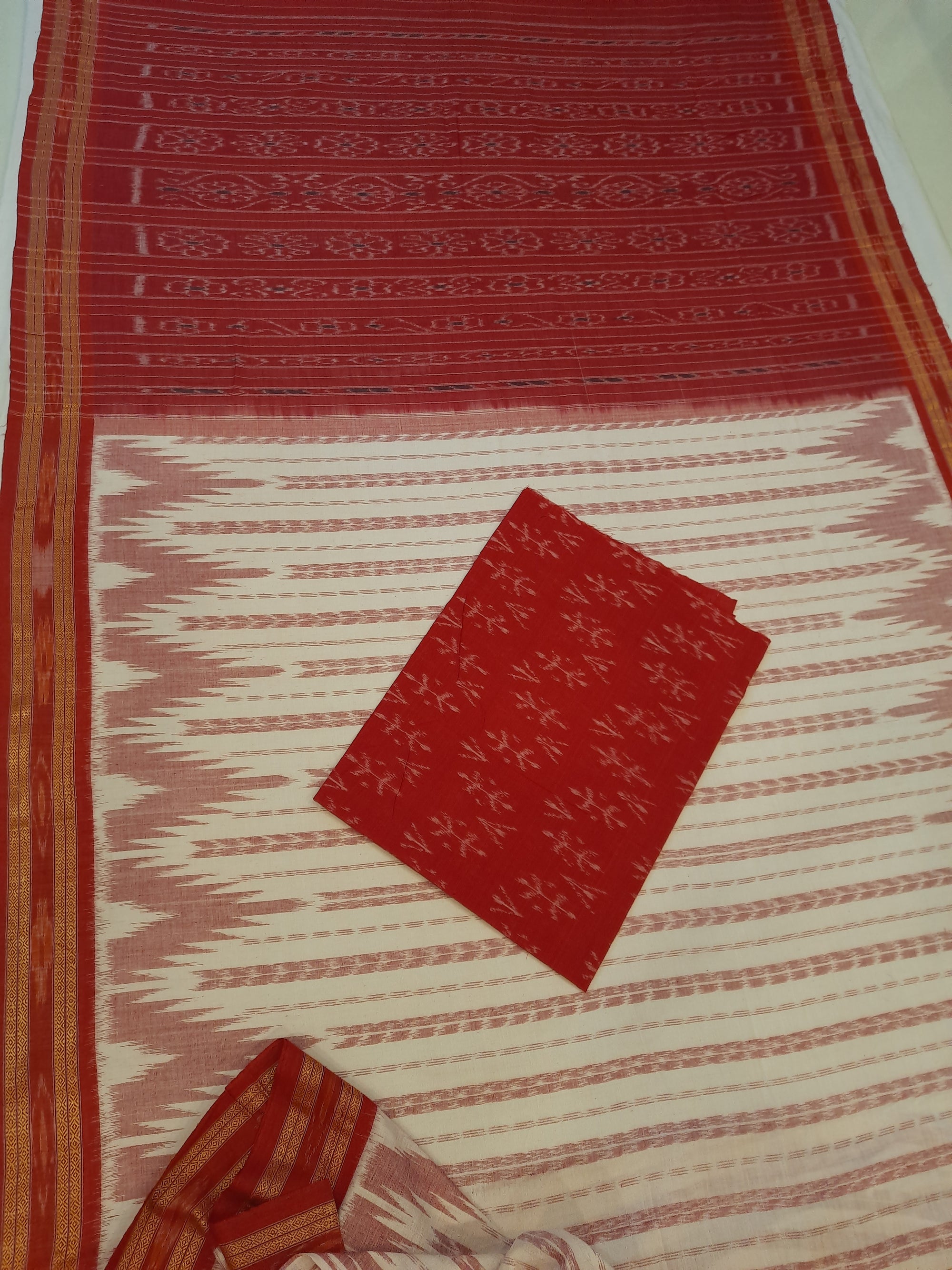 Off-white with Red Cotton Odisha Ikat saree with cotton ikat blouse piece