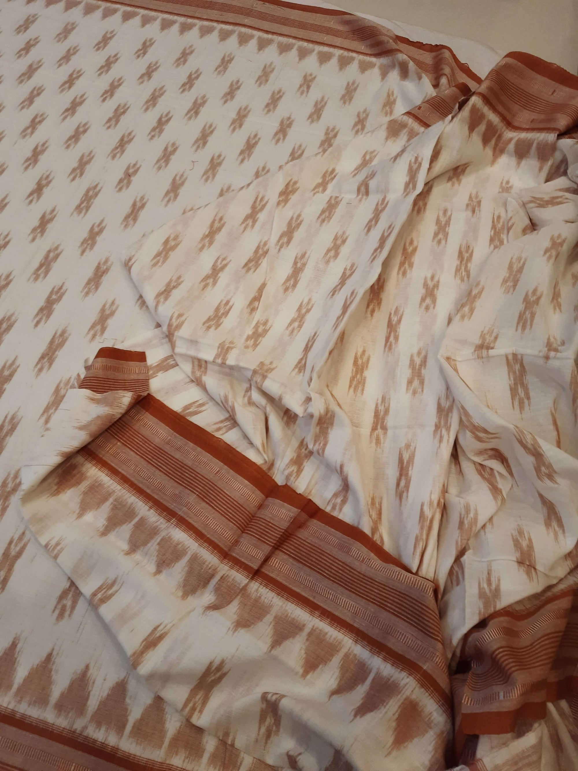 Off-white Cotton Odisha Ikat saree with cotton ikat blouse piece