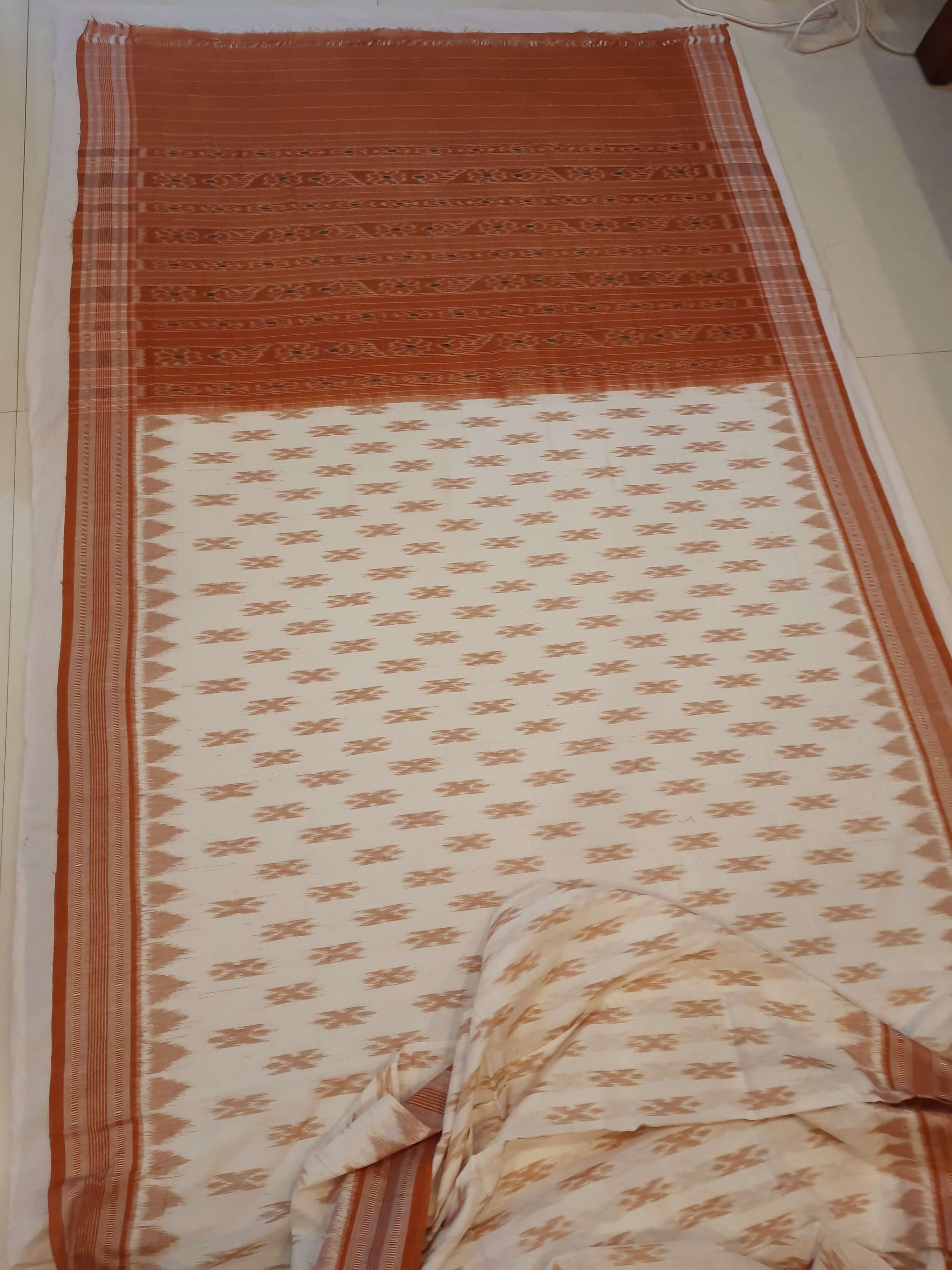 Off-white Cotton Odisha Ikat saree with cotton ikat blouse piece
