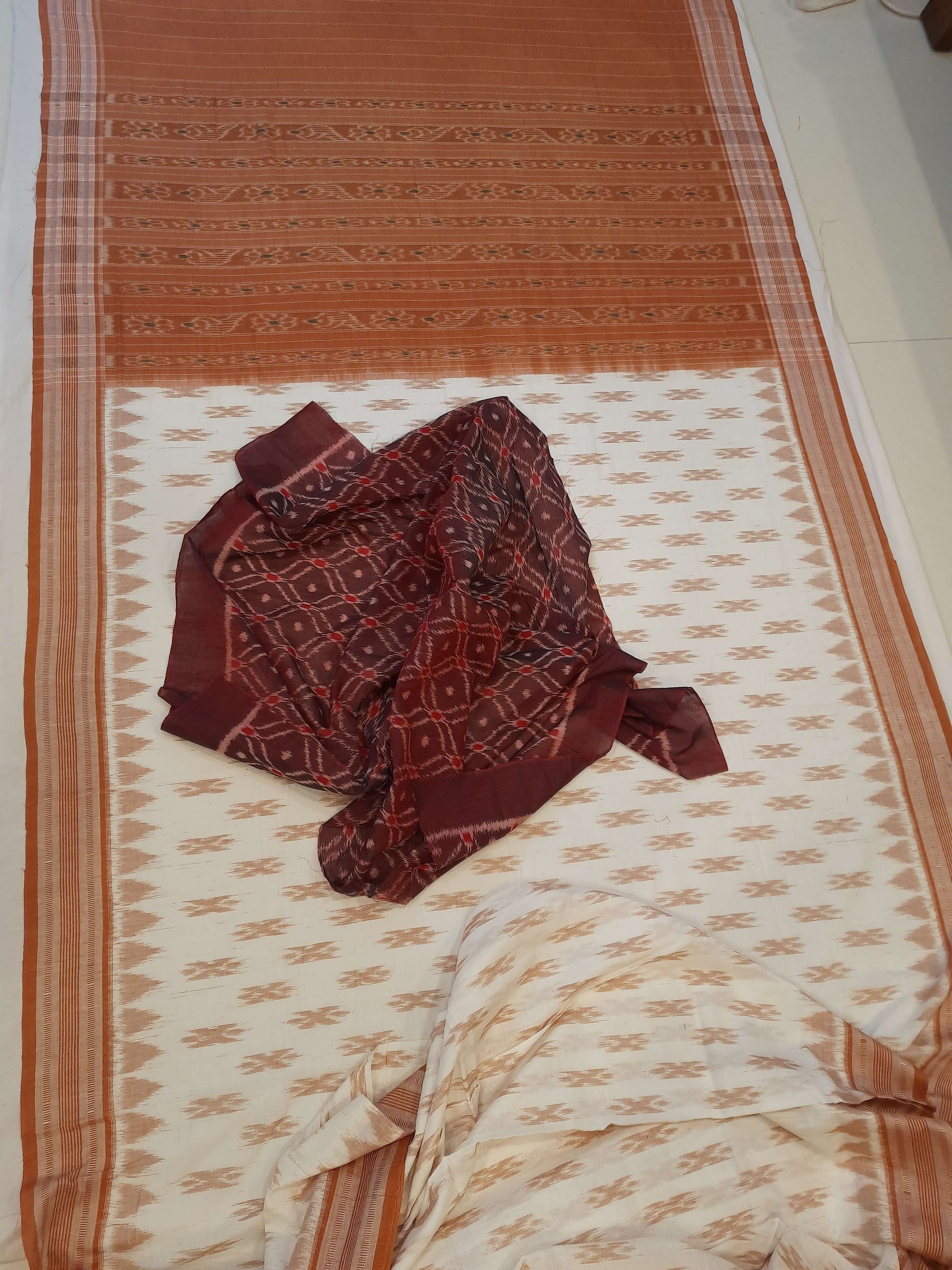 Off-white Cotton Odisha Ikat saree with cotton ikat blouse piece