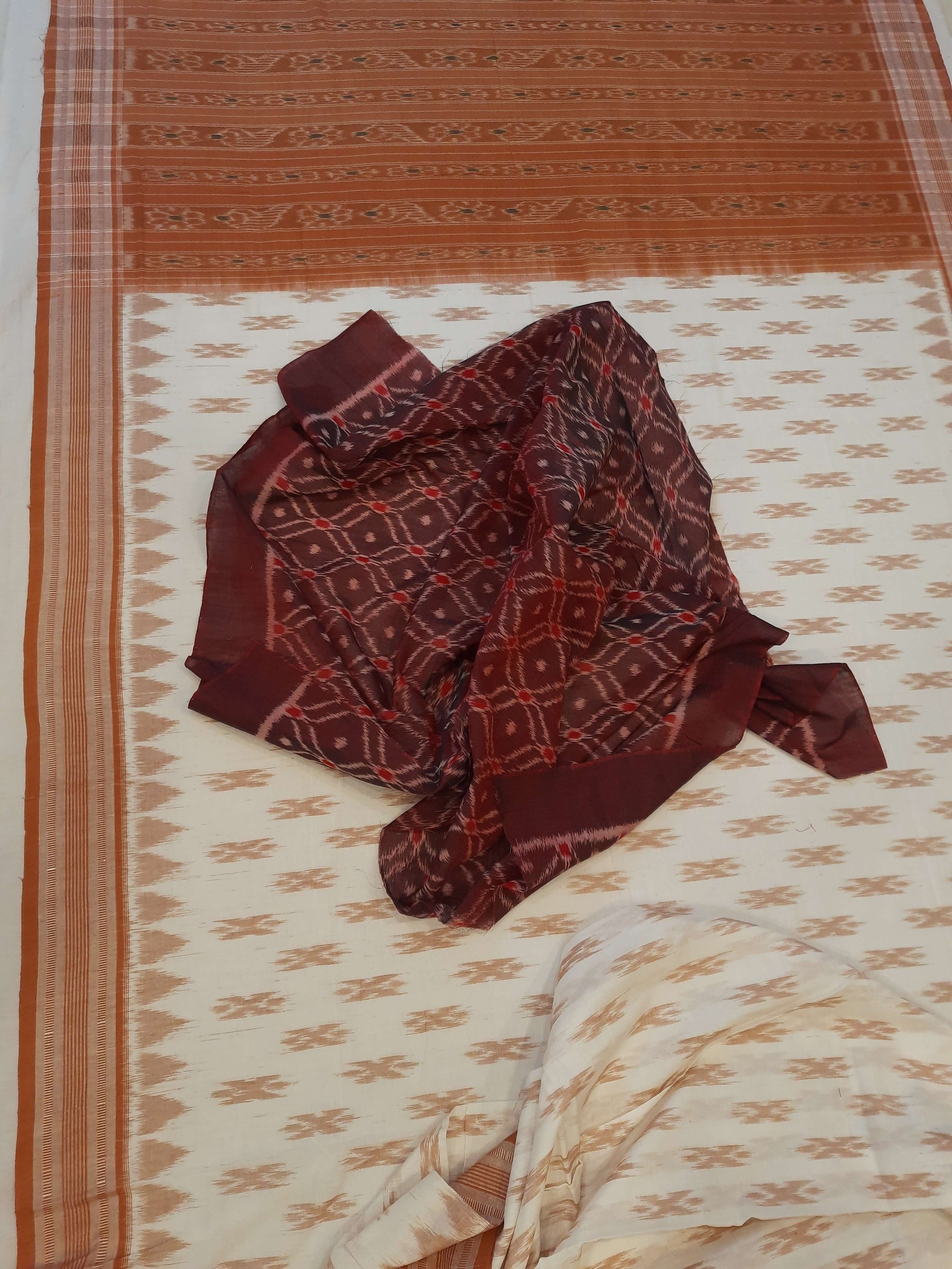 Off-white Cotton Odisha Ikat saree with cotton ikat blouse piece