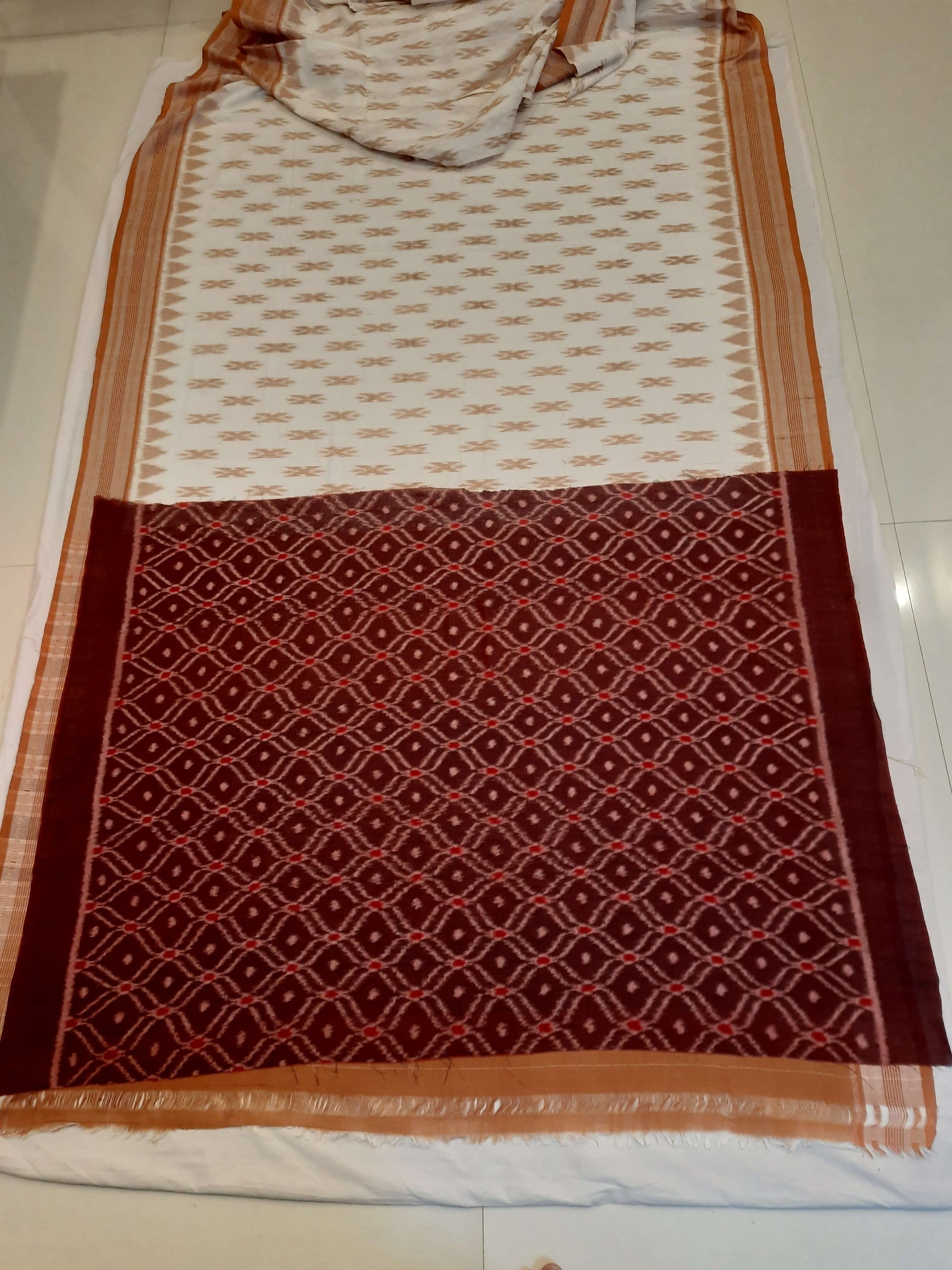 Off-white Cotton Odisha Ikat saree with cotton ikat blouse piece