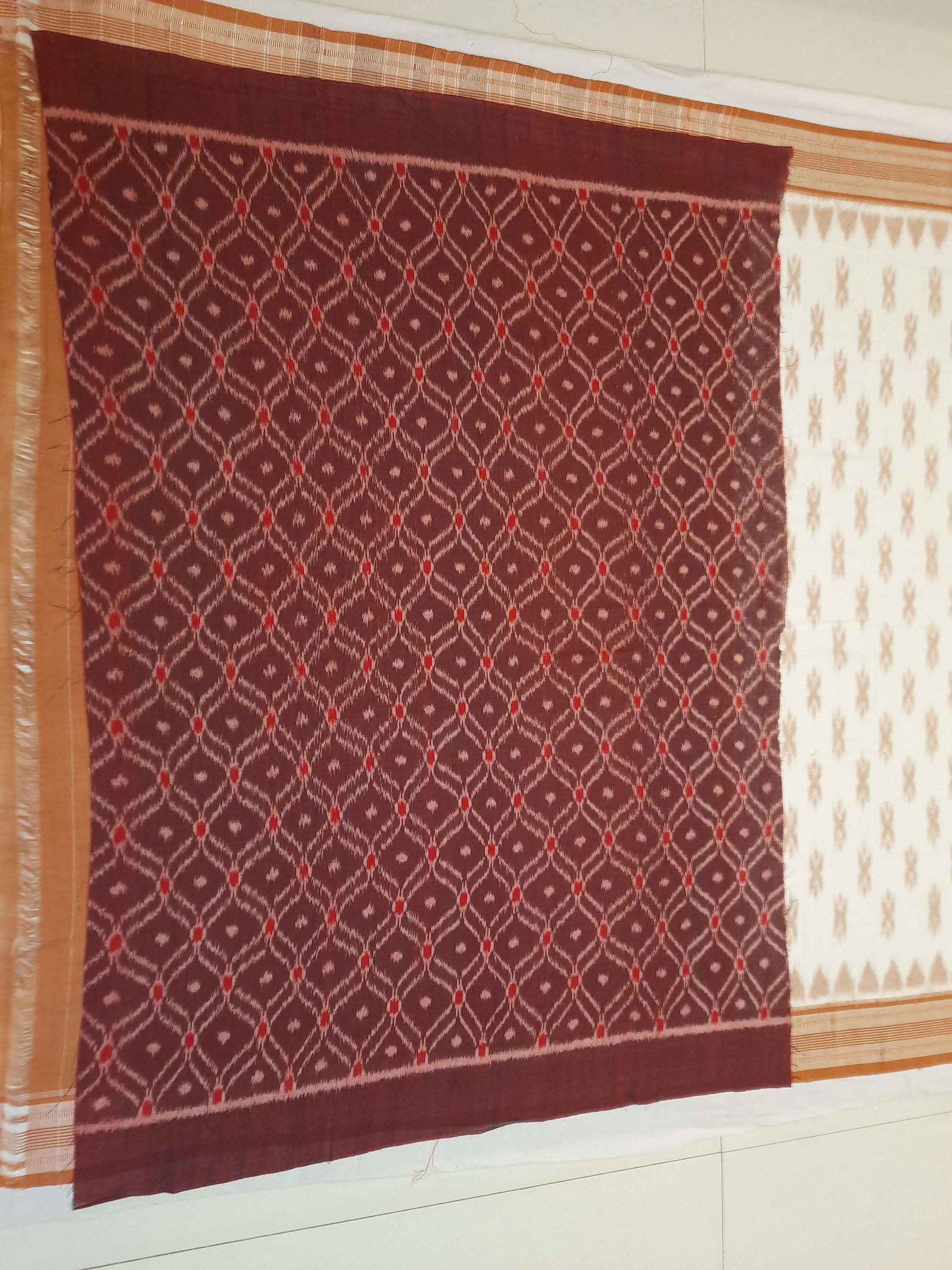 Off-white Cotton Odisha Ikat saree with cotton ikat blouse piece