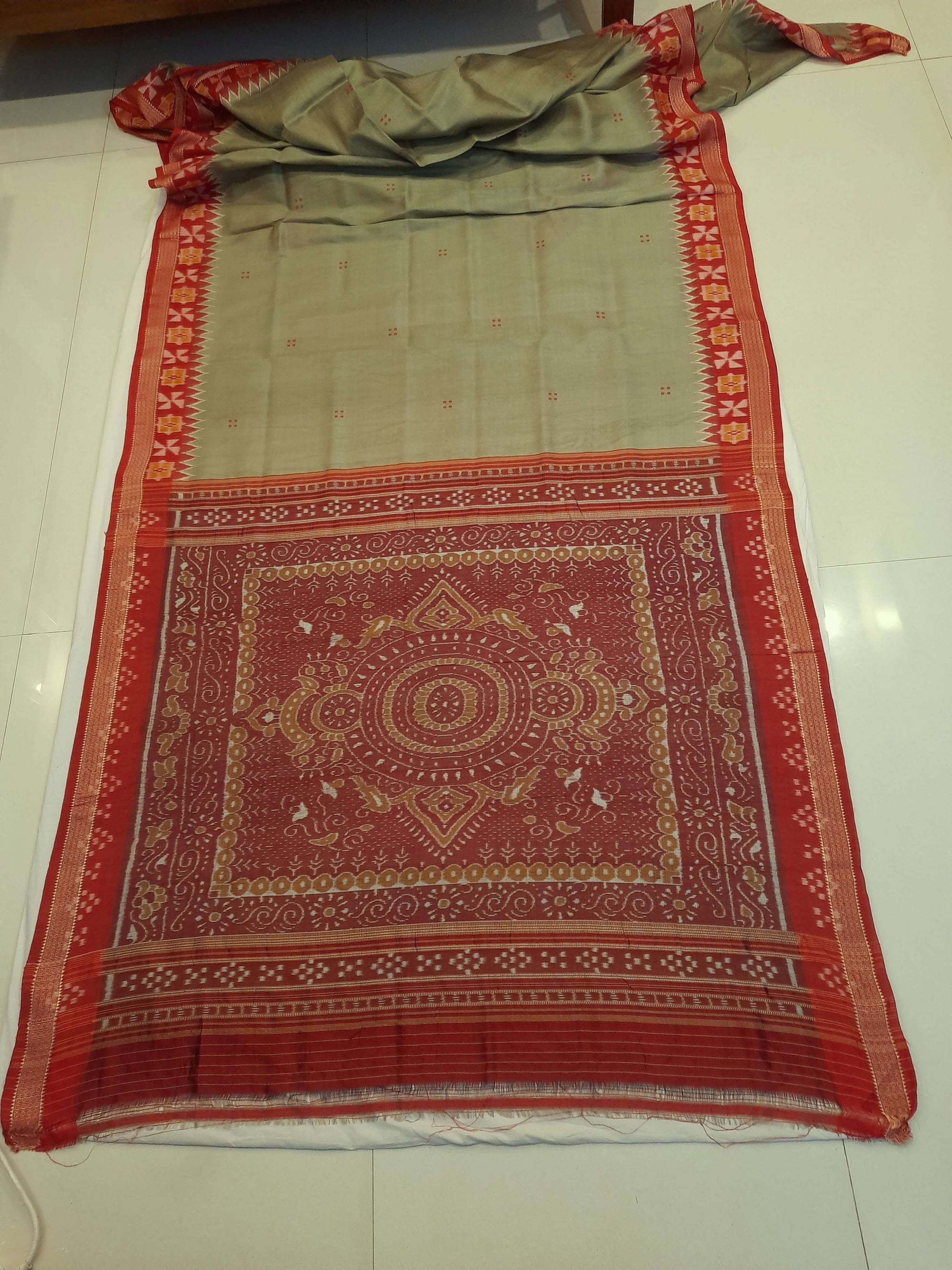 Greenish Grey Odisha Khandua Patta Silk Saree paired with cotton ikat blouse piece